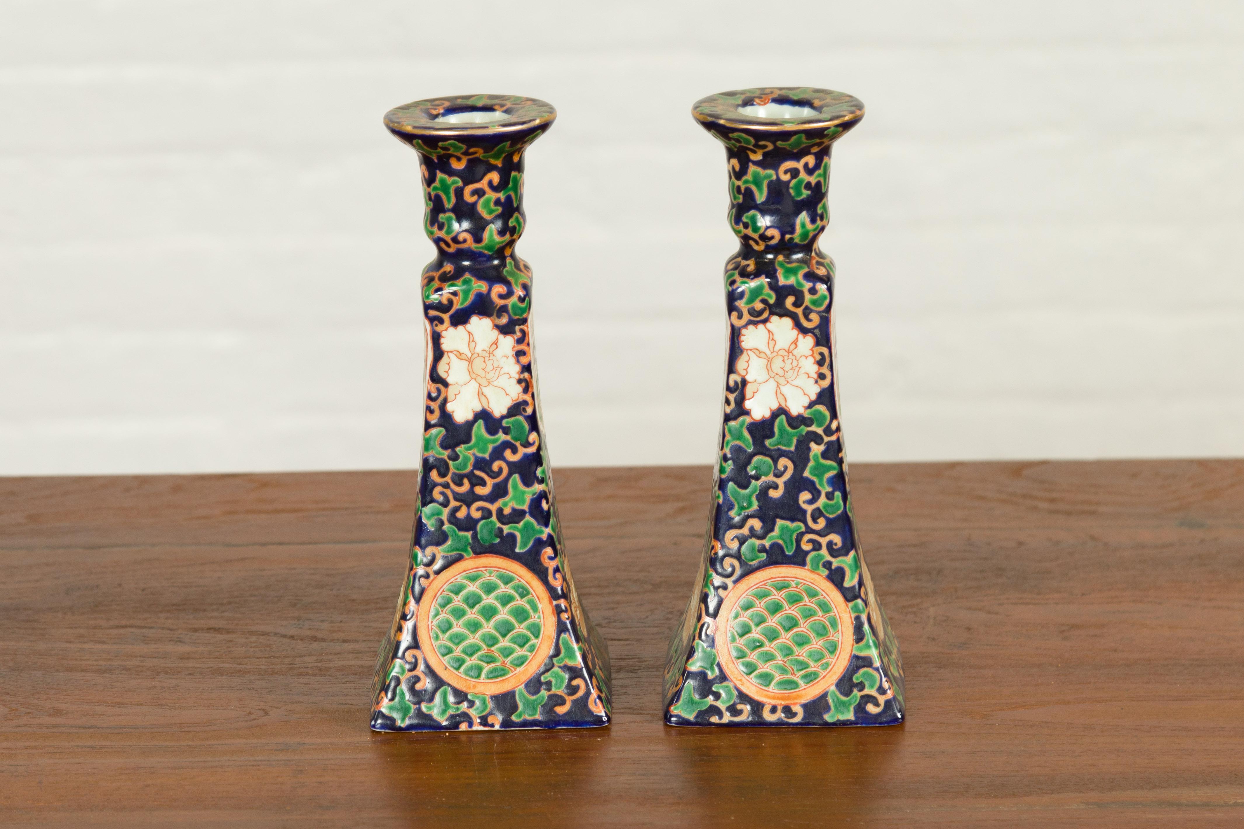 Ceramic Pair of Chinese Hand Painted Candlesticks with Cobalt Blue Ground and Cartouches For Sale