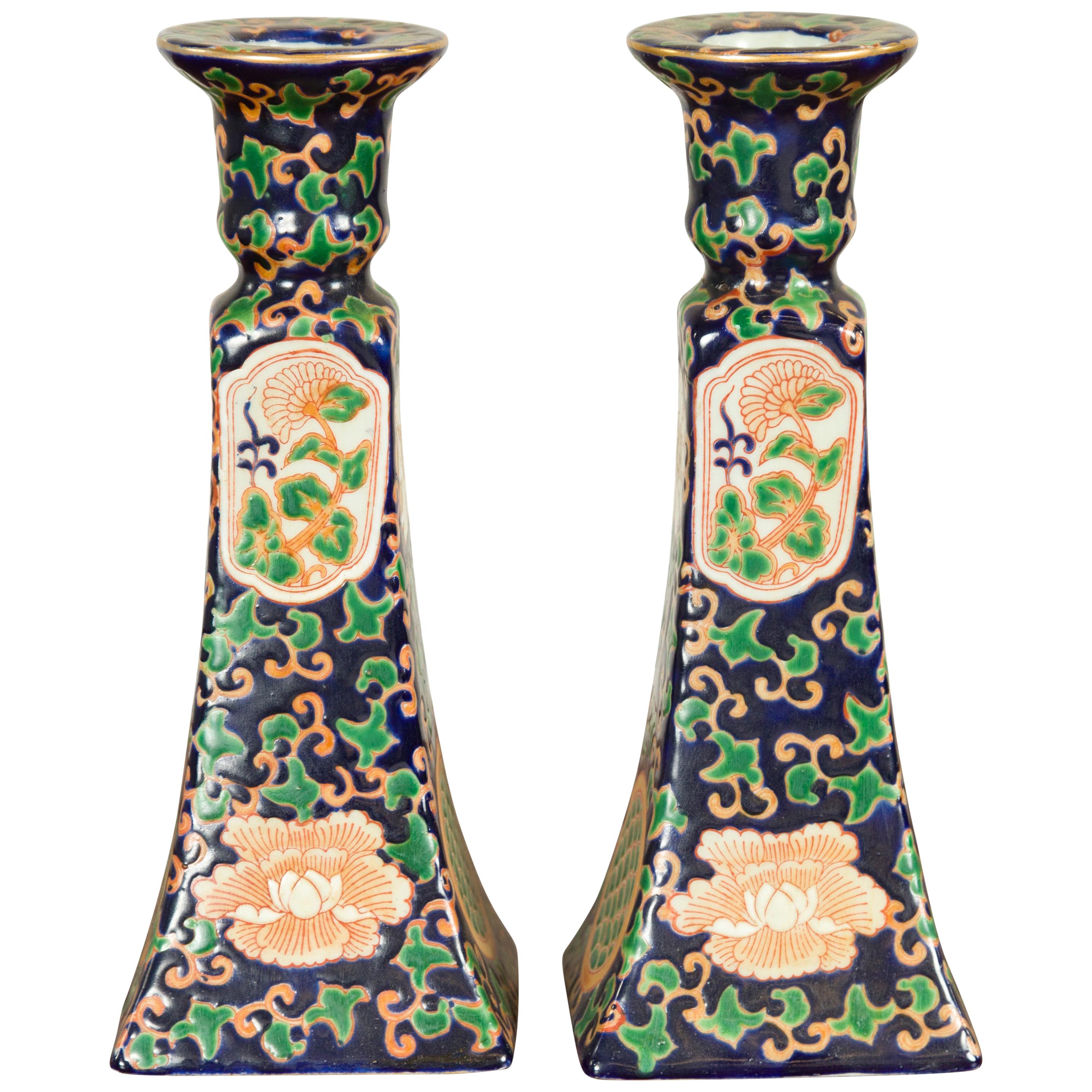 Pair of Chinese Hand Painted Candlesticks with Cobalt Blue Ground and Cartouches For Sale