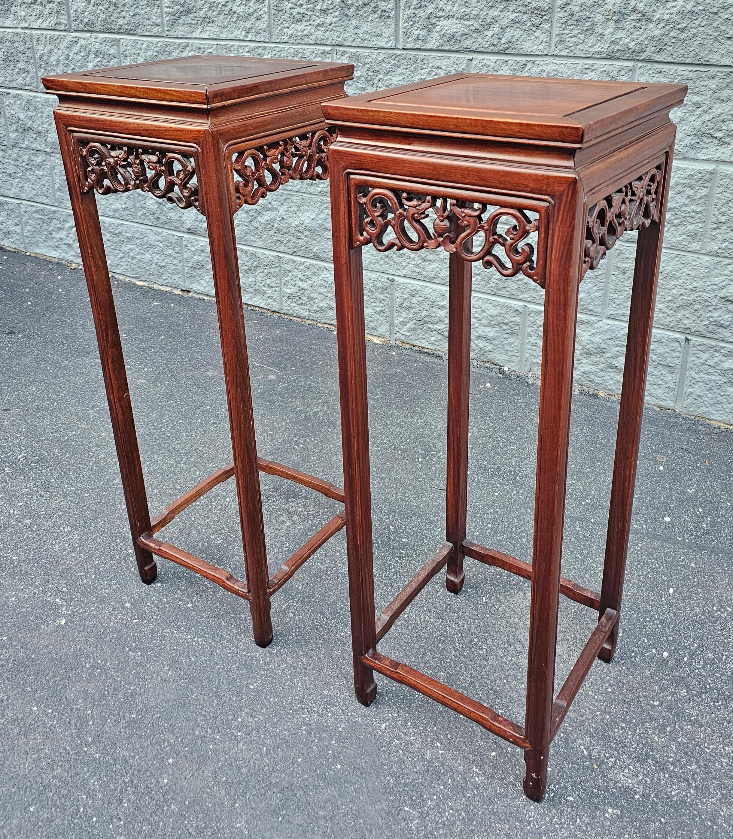 A Stunning slender Pair of mid 20th century Chinese Hongmu Stands Pedestals / Plant Stands.  Measures 12.5