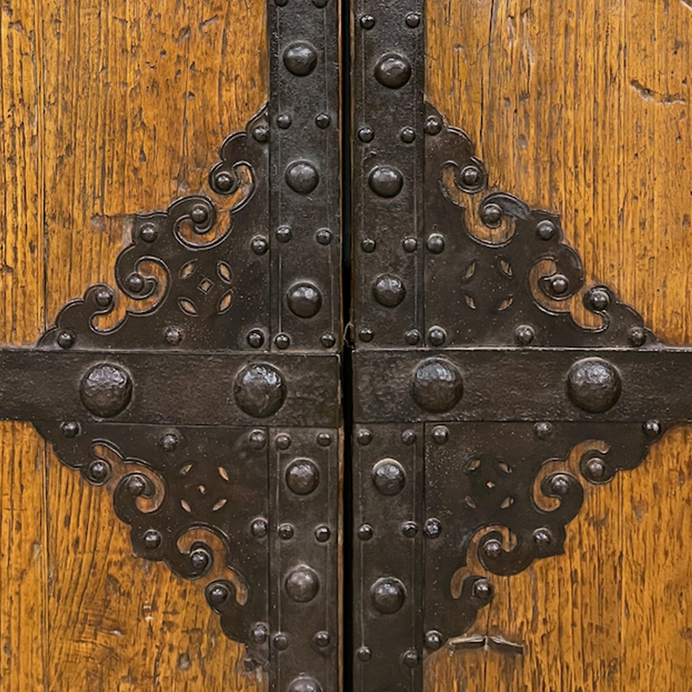Pair of Chinese Iron Bound Courtyard Doors with Frame, c. 1850 In Good Condition For Sale In Chicago, IL