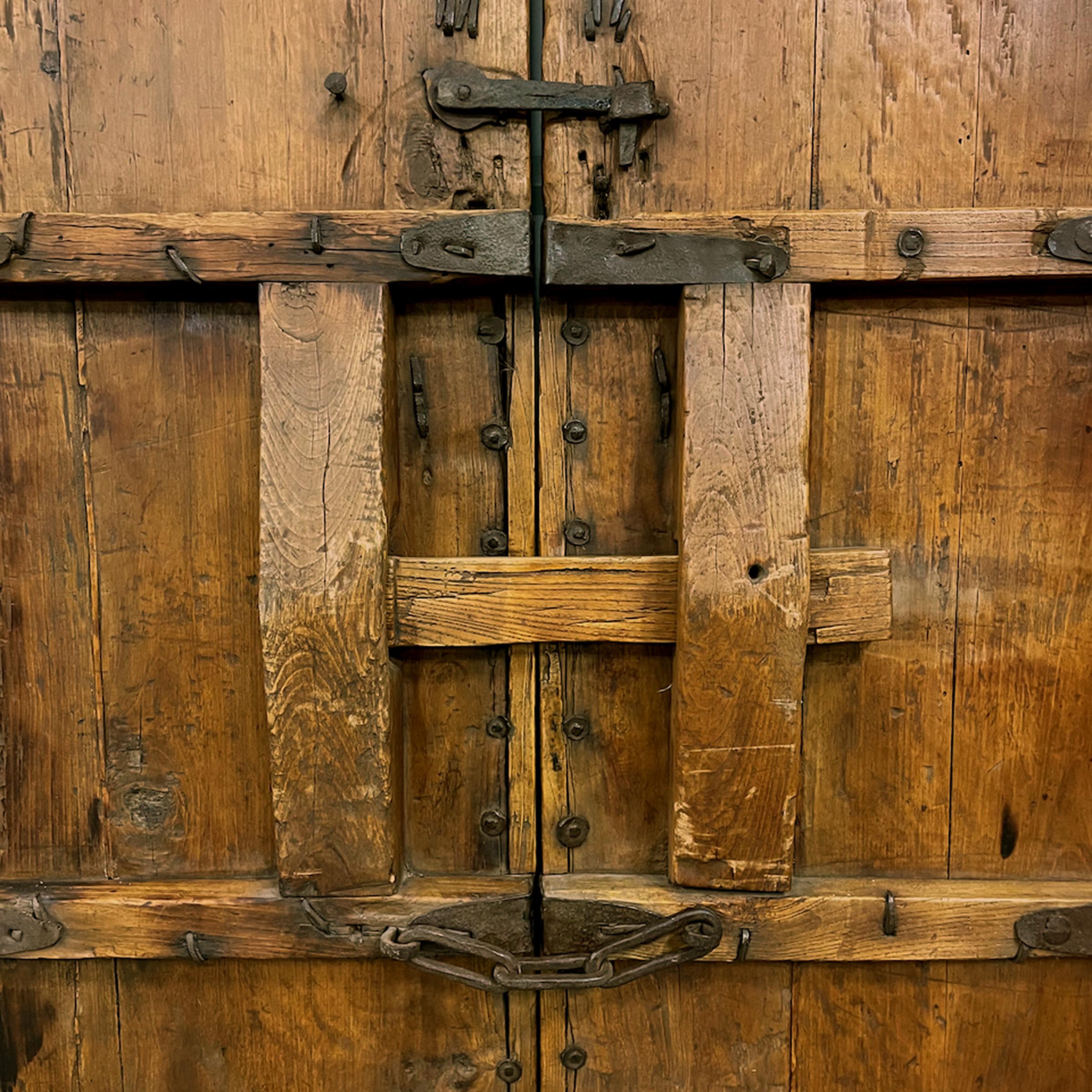 19th Century Pair of Chinese Iron Bound Courtyard Doors with Frame, c. 1850 For Sale