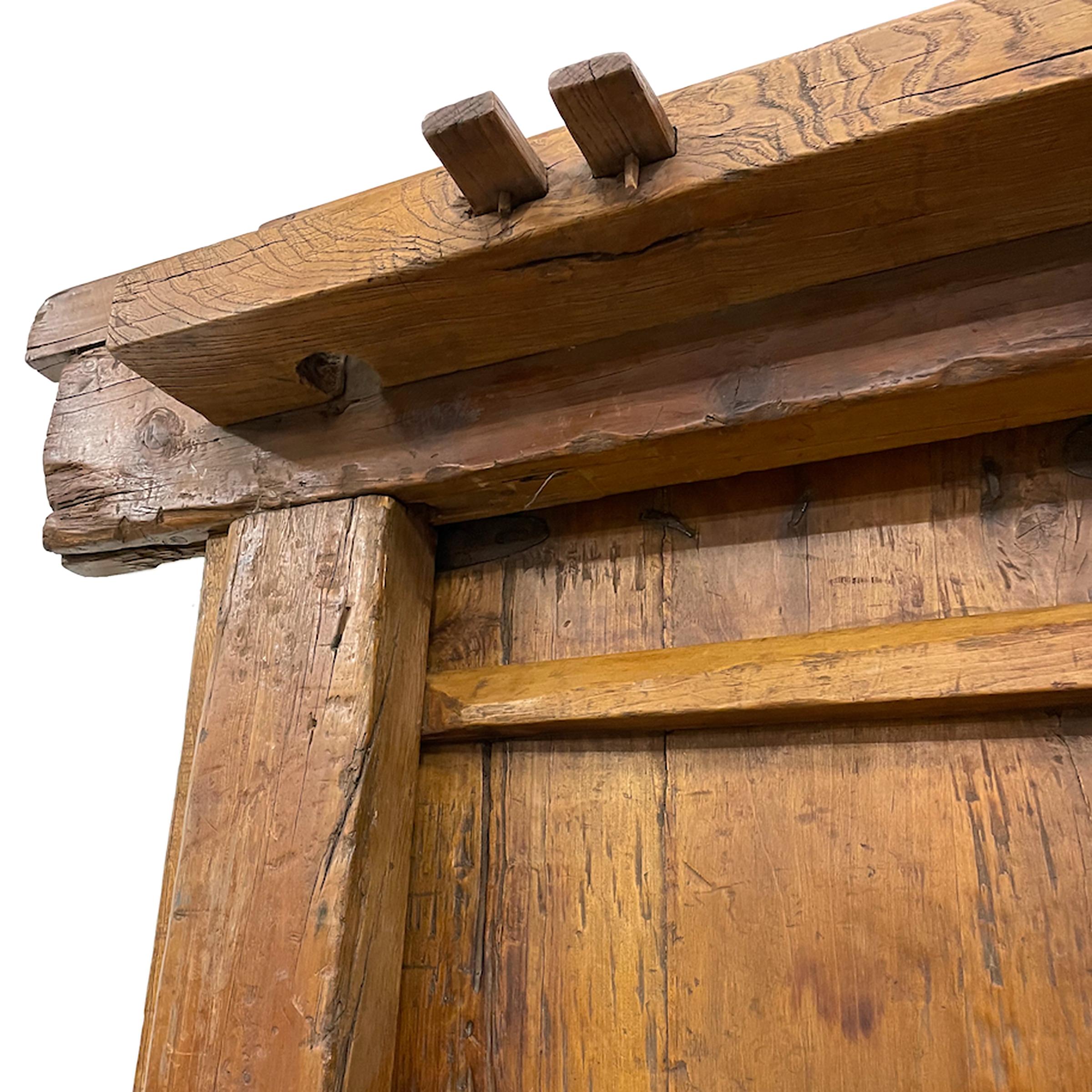 19th Century Pair of Chinese Iron Bound Courtyard Doors with Frame, c. 1850