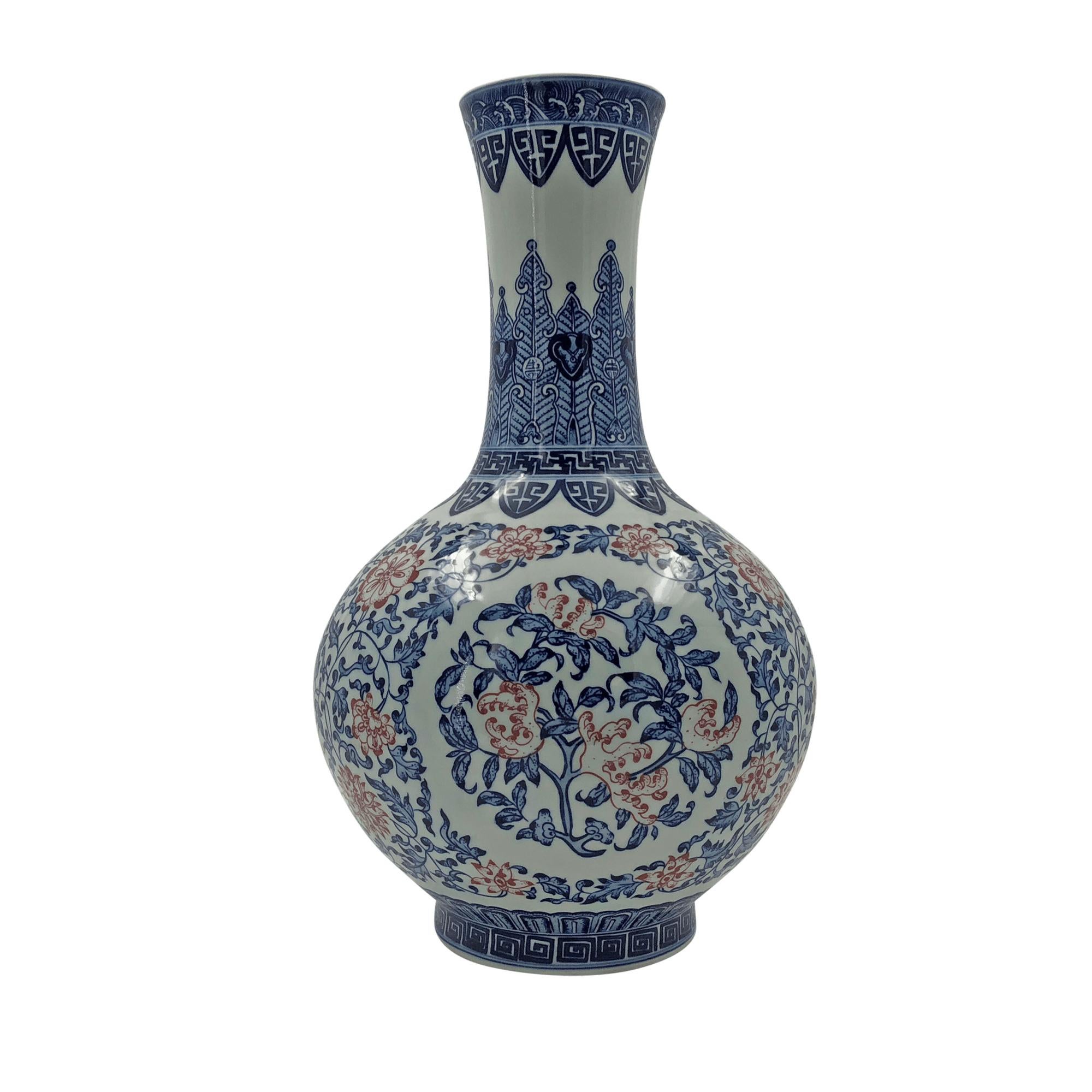 A pair of large Chinese export iron red, blue and white tall bottle vase with panels of floral bouquets.
