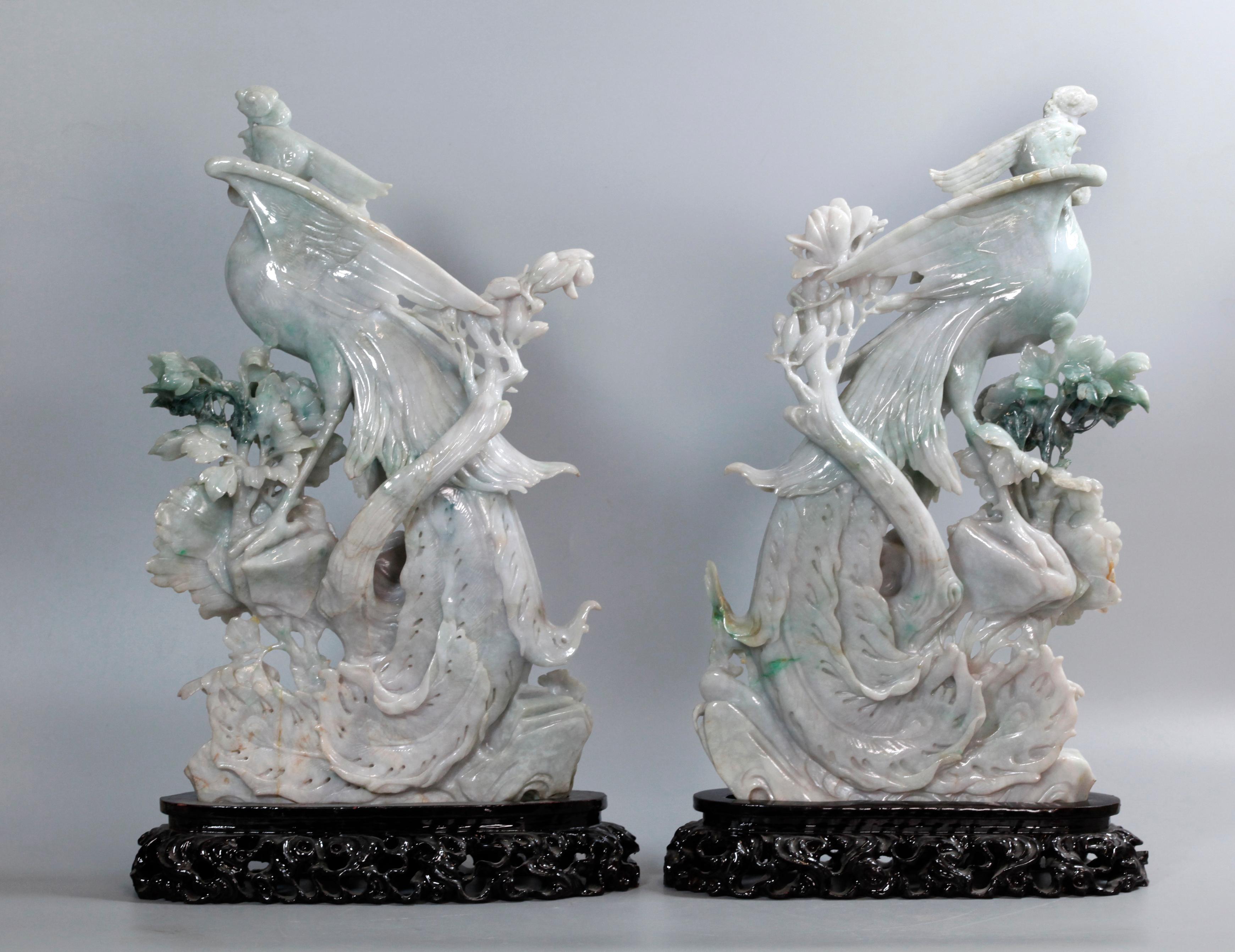 wooden bases shown in pictures are included with these items; each phoenix is carved from a single piece of jade; jade with apple green tones; approximate measurements of each (overall with wooden base ): 19.5in(H) x 11in(W) x 2.5in(D); approximate