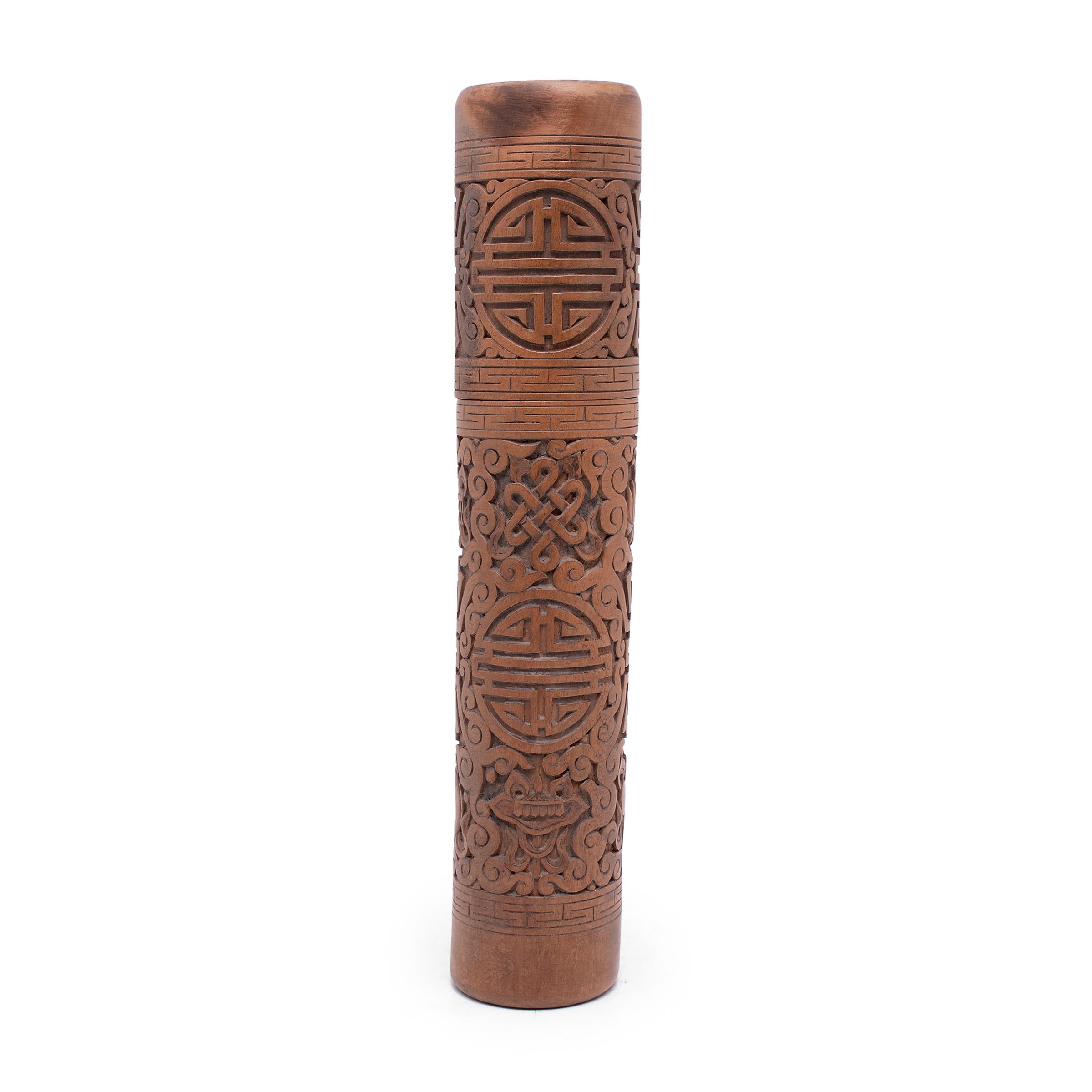 Delicately carved of dense hardwood, these 19th-century scroll cases were an essential accessory for the esteemed Qing-dynasty scholar. The perfect size for a rolled-up scroll, the cases were once used to store and protect works of traditional