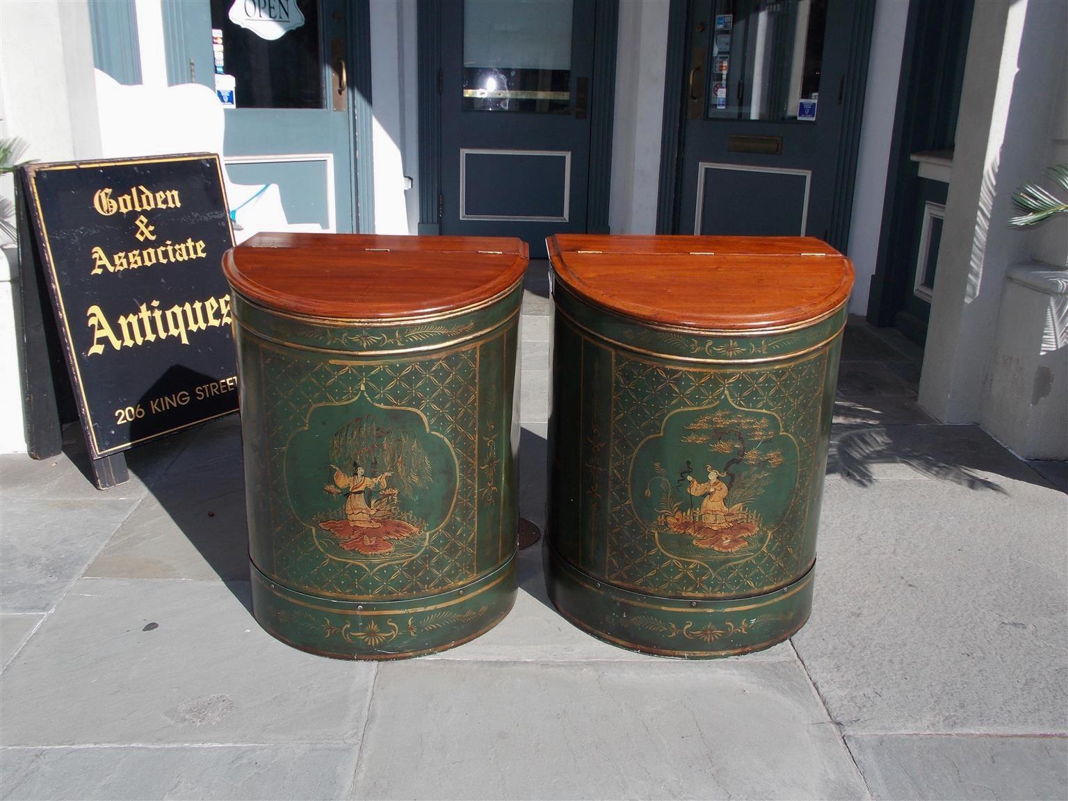 Pair of Chinese mahogany and tin hinged painted tea bins with gilt figural stenciling and decorative landscape scenes with bird motif, Mid-19th century.