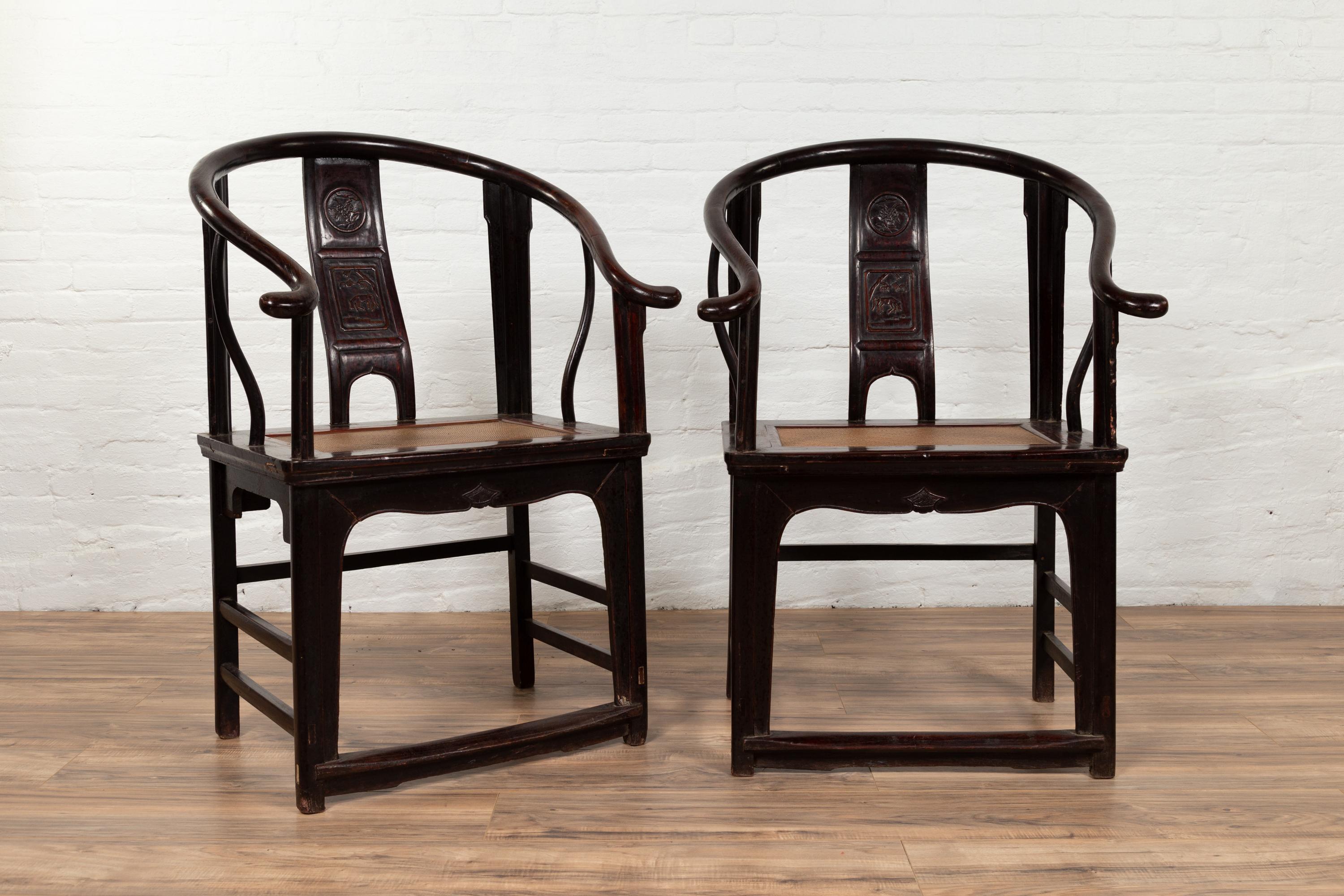 Carved Pair of Chinese Ming Dynasty Style Horseshoe Back Armchairs with Dark Patina