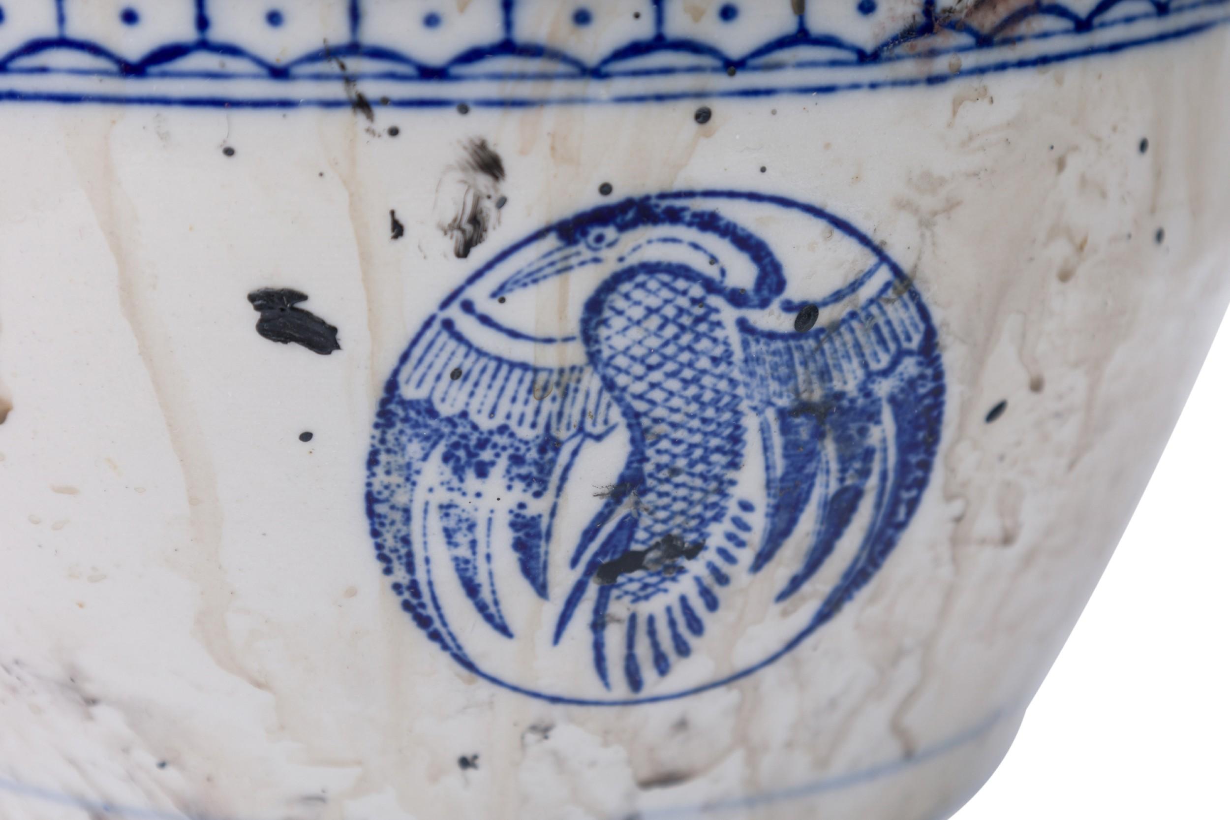 PAIR of Chinese blue & white porcelain covered bowls featuring identical painted bird medallions. The larger bowl was fired in a stippled, textured glaze with a more flattened top and scaled up medallions. Both bowls are bordered with the same