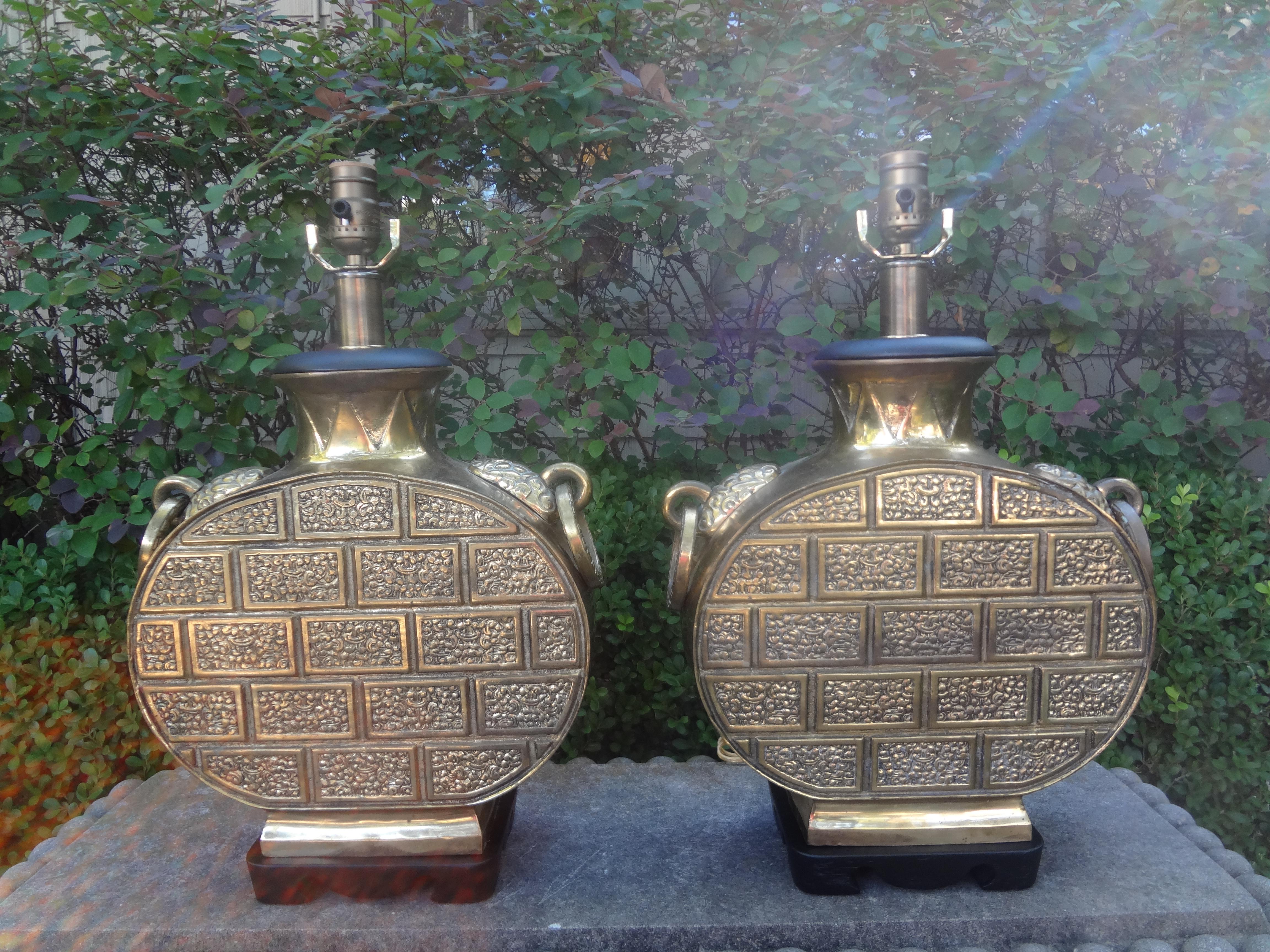 Pair of Chinese Modern Brass Lamps.
A great pair of well detailed Chinese modern or Asian modern brass table lamps This versatile pair of lamps have been newly wired with new sockets and would work well in a variety of interiors.
Great patina!