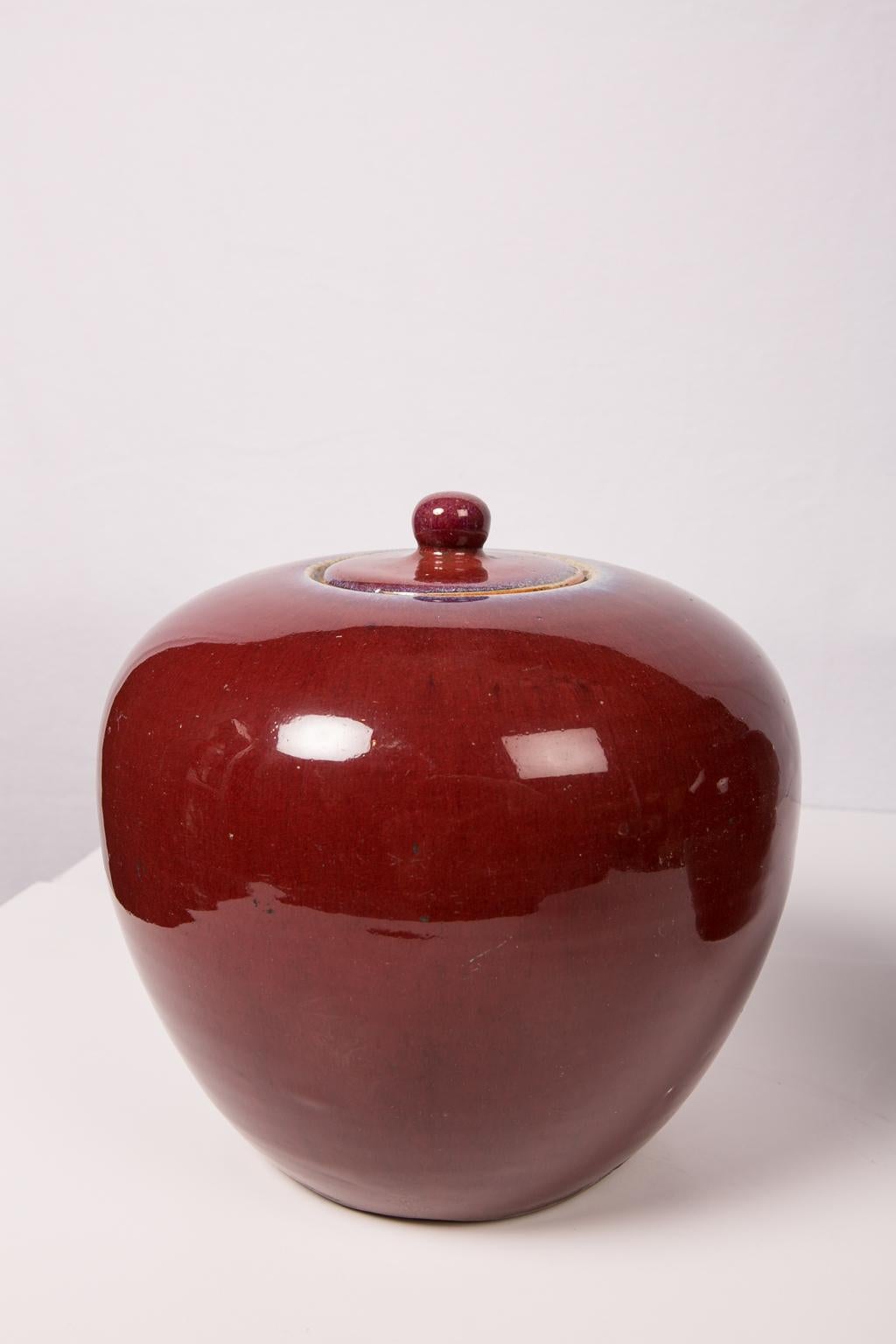 WHY WE LOVE THEM: Antique but yet so Modern!
We are pleased to offer this pair of Chinese monochrome red ( sang-de-boeuf ) ginger jars dated to Xianfeng and Tongzhi periods. (1831-1875). The warm, deep red glaze is rich and fully covers the body of