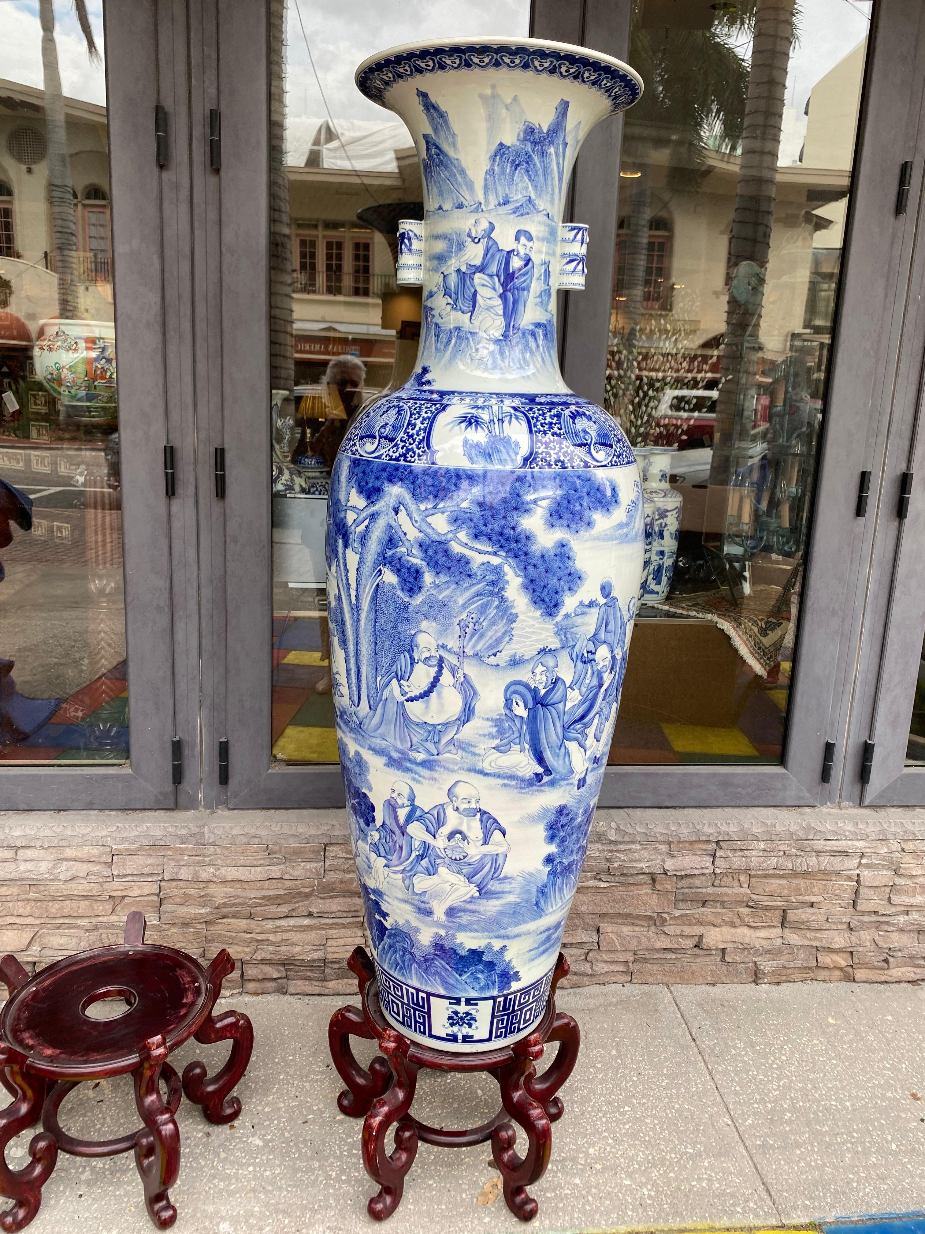 (First off the photo looks a little dark at the top but they are not )
A matched pair (you see the front of one and the back of the other).
This pair of monumental Chinese blue and white vases (65