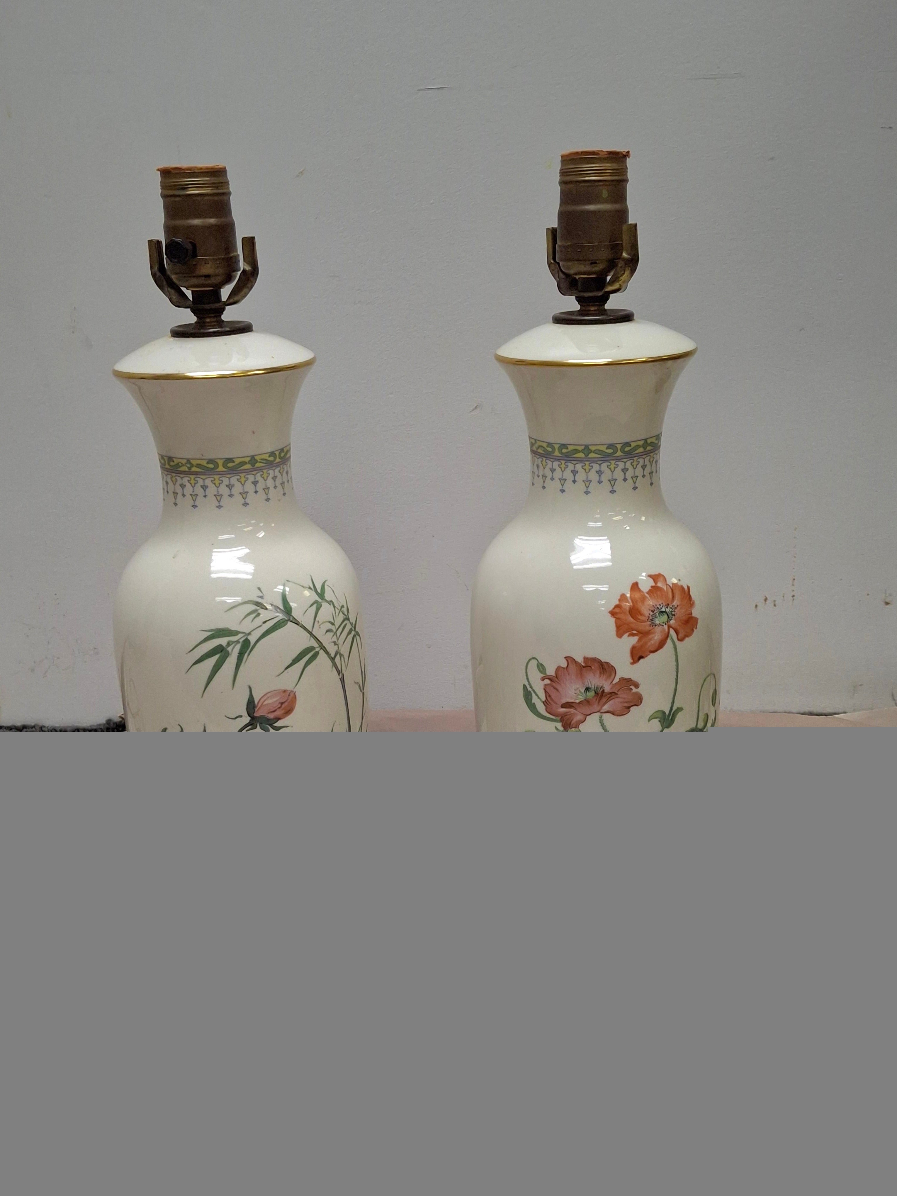 Pair of Chinese Off-White Floral Porcelain Table Lamps Mounted on Mahogany Base
Measures: 5