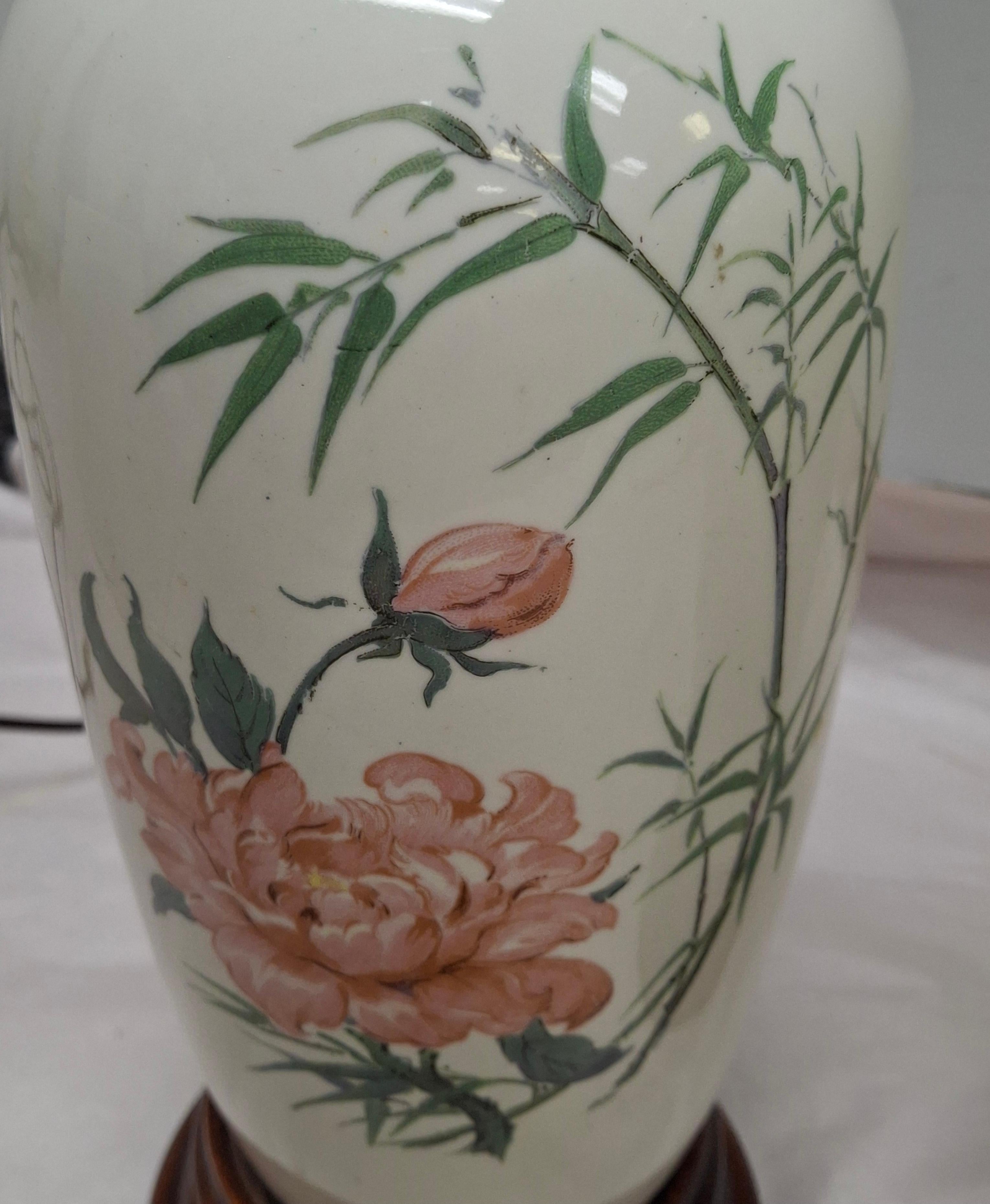 American Pair of Chinese Off-White Floral Porcelain Table Lamps on Carved Mahogany Base For Sale