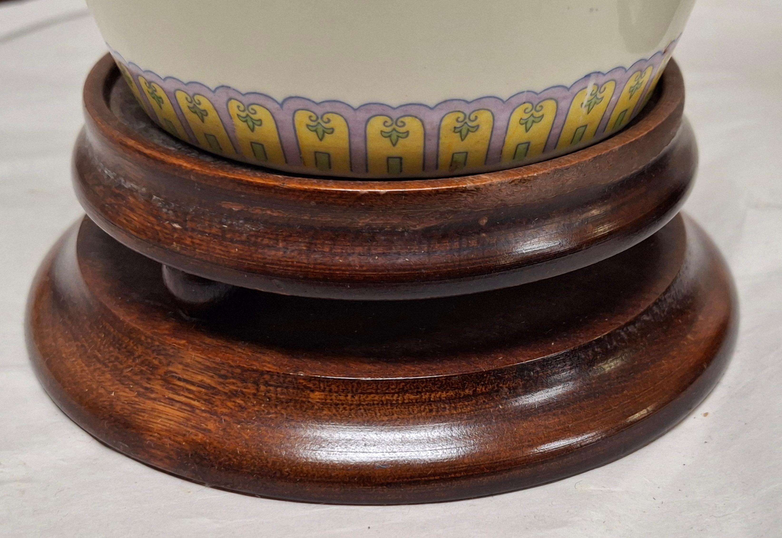 Pair of Chinese Off-White Floral Porcelain Table Lamps on Carved Mahogany Base In Good Condition For Sale In Germantown, MD