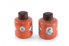 Pair of Chinese Orange Lidded Porcelain Jars