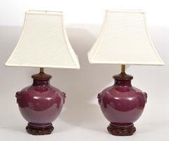 Pair of Chinese Oxblood Glazed Urn Shaped Table Lamps with Haut Relief, 20th C
