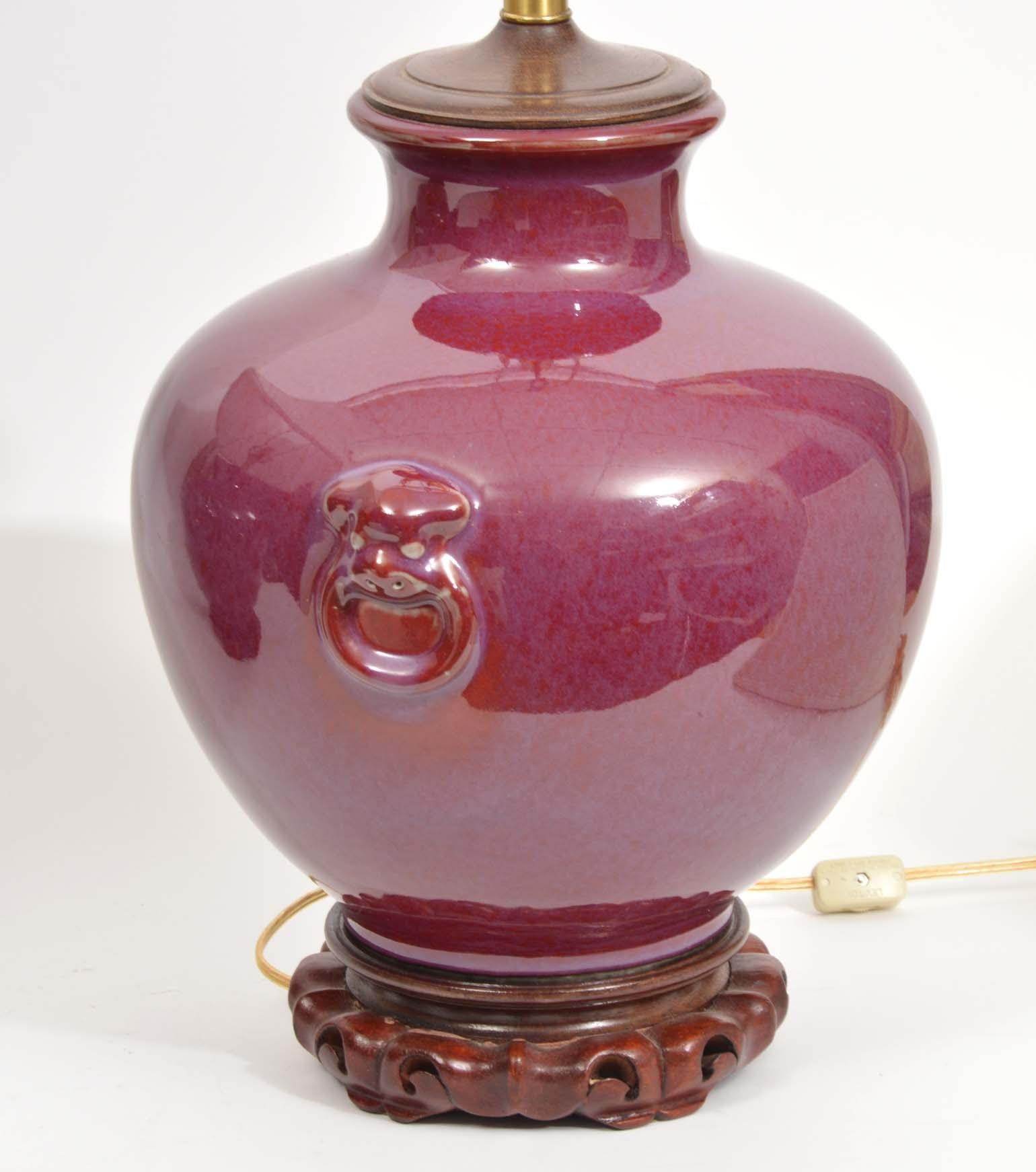 20th Century Pair of Chinese Oxblood Glazed Urn Shaped Table Lamps with Haut Relief, 20th C
