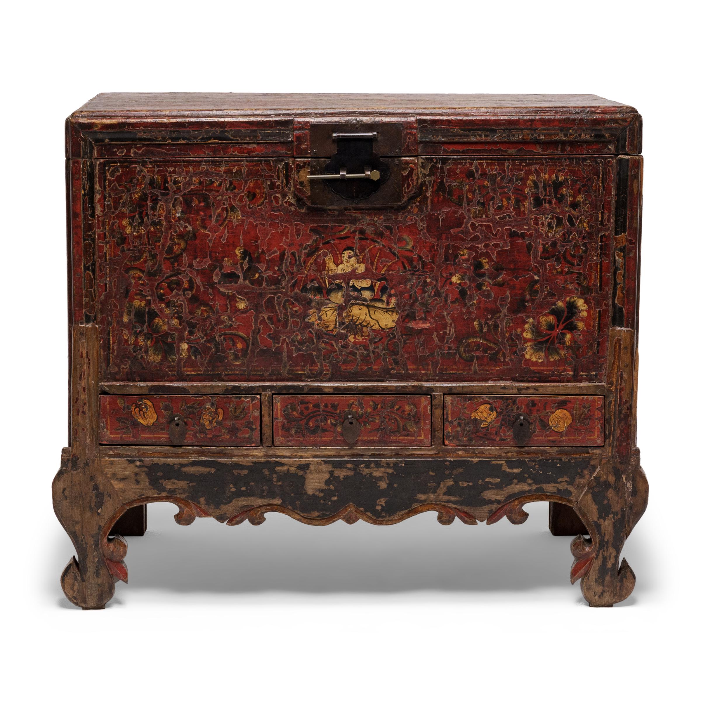 This statement pair of storage trunks from northern China accent modern interiors with rich color, hand-painted artistry and a weathered texture that only time can achieve. Dated to the early 19th century, the low chests would have been used for