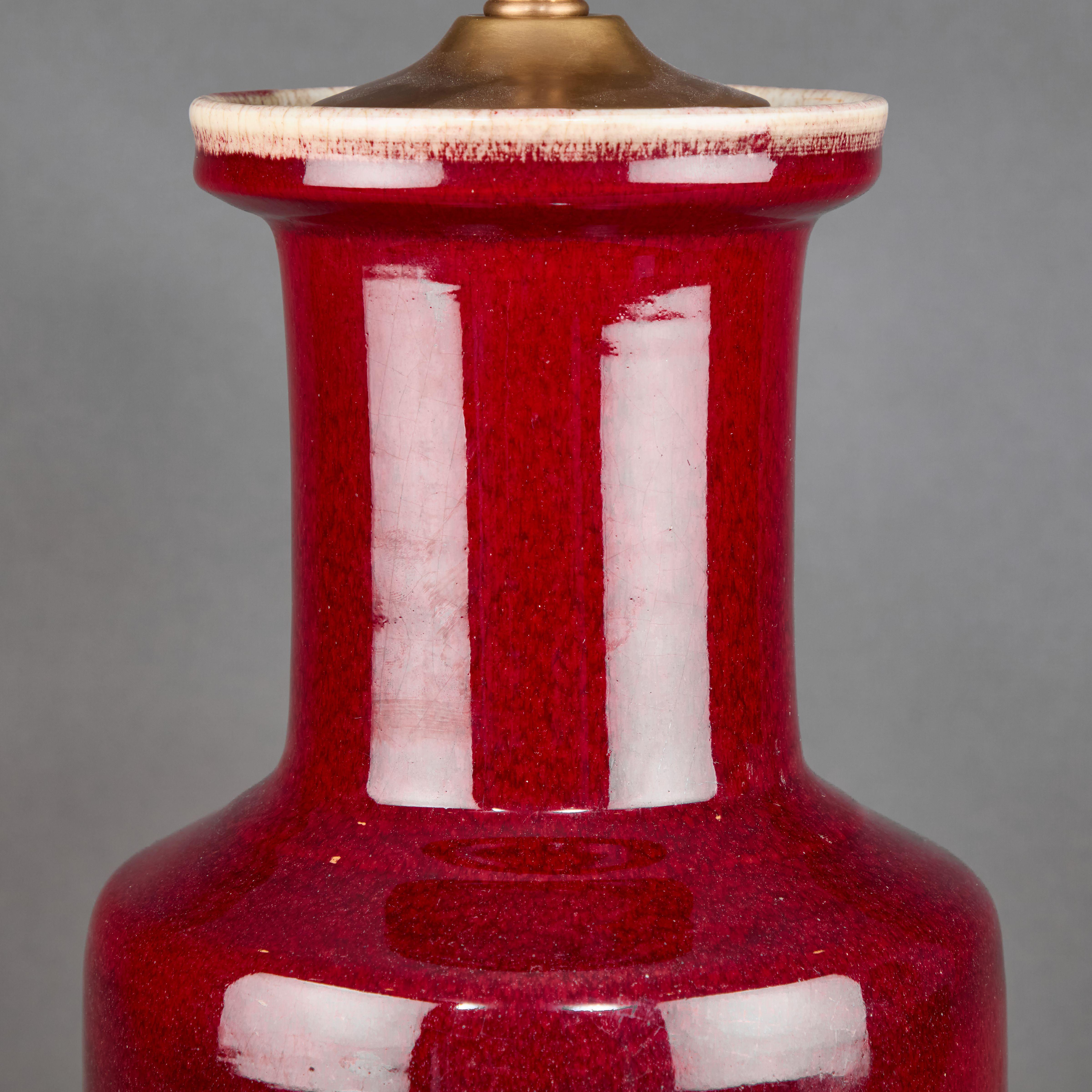 Pair of Chinese Porcelain Oxblood Lamps 17th Century on contemporary turned bases. Qing Dynasty.

7.5″ diam x 28″h
