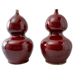 Pair of Chinese Oxblood Sang de Boeuf Double Gourd Vases