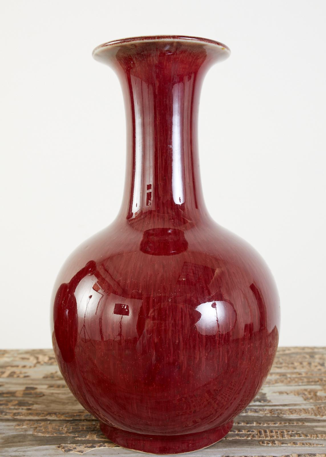 Glazed Pair of Chinese Oxblood Sang de Boeuf Lang Yao Vases