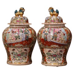 Paire de pots à gingembre en porcelaine peinte et dorée de la famille Rose avec couvercles