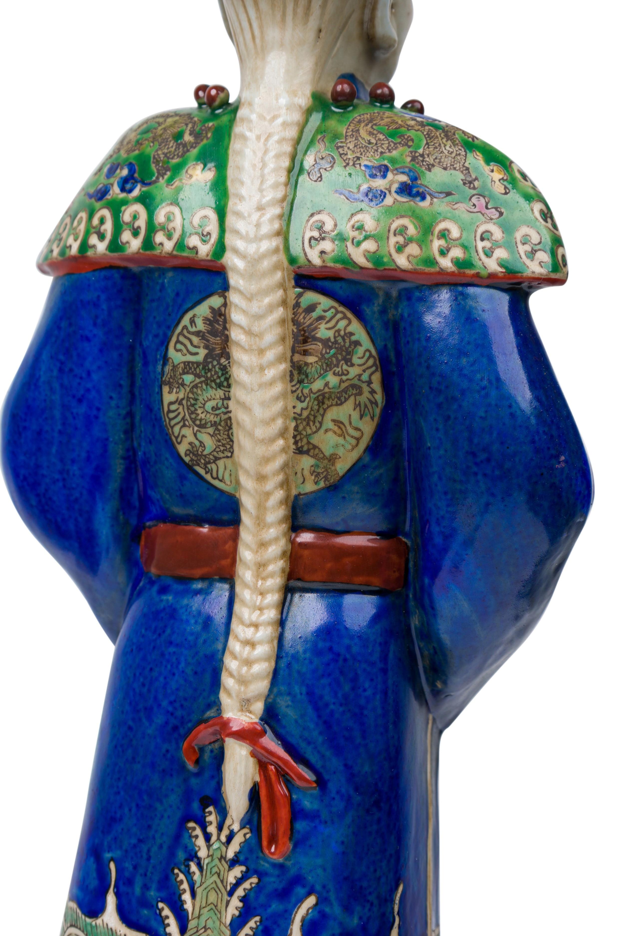 Pair of Chinese Painted Ceramic Figures Depicting a Blue Robed Emperor In Good Condition For Sale In New York, NY