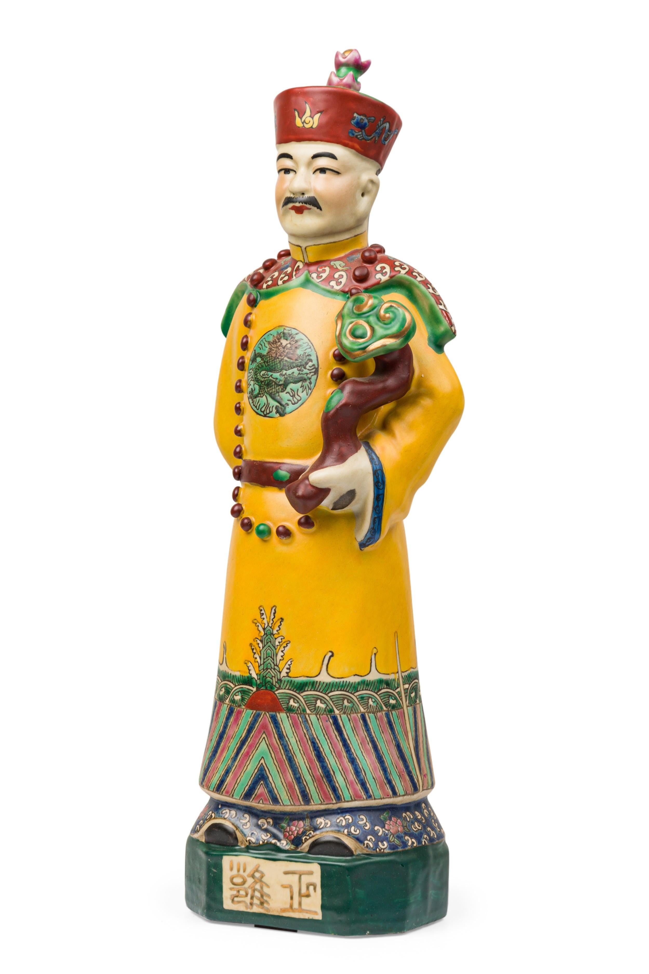 Pair of Chinese Painted Ceramic Figures Depicting a Yellow Robed Emperor For Sale 1