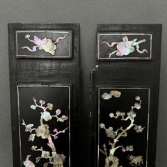 Pair of Chinese panels in ebonized wood with mother-of-pearl inlay