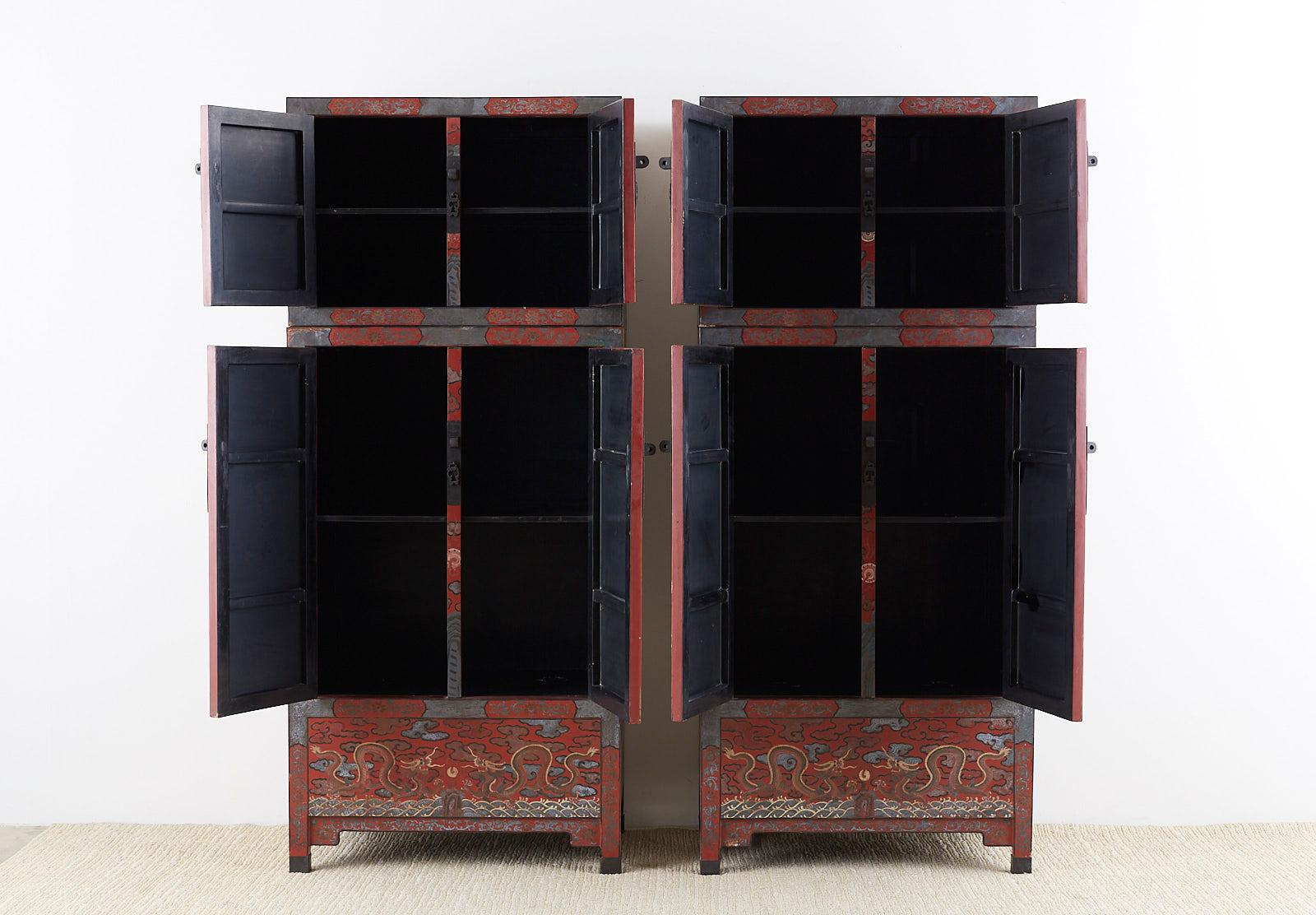 Chinese Export Pair of Chinese Polychrome Decorated Compound Dragon Cabinets
