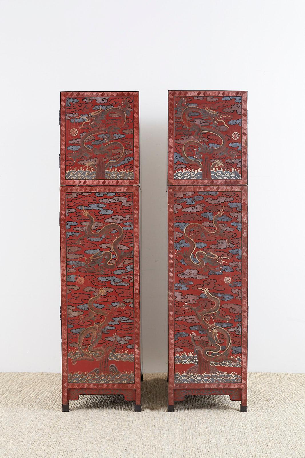 Ebonized Pair of Chinese Polychrome Decorated Compound Dragon Cabinets