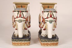 Pair of Chinese Polychrome decorated stoneware elephants Form Garden Seats