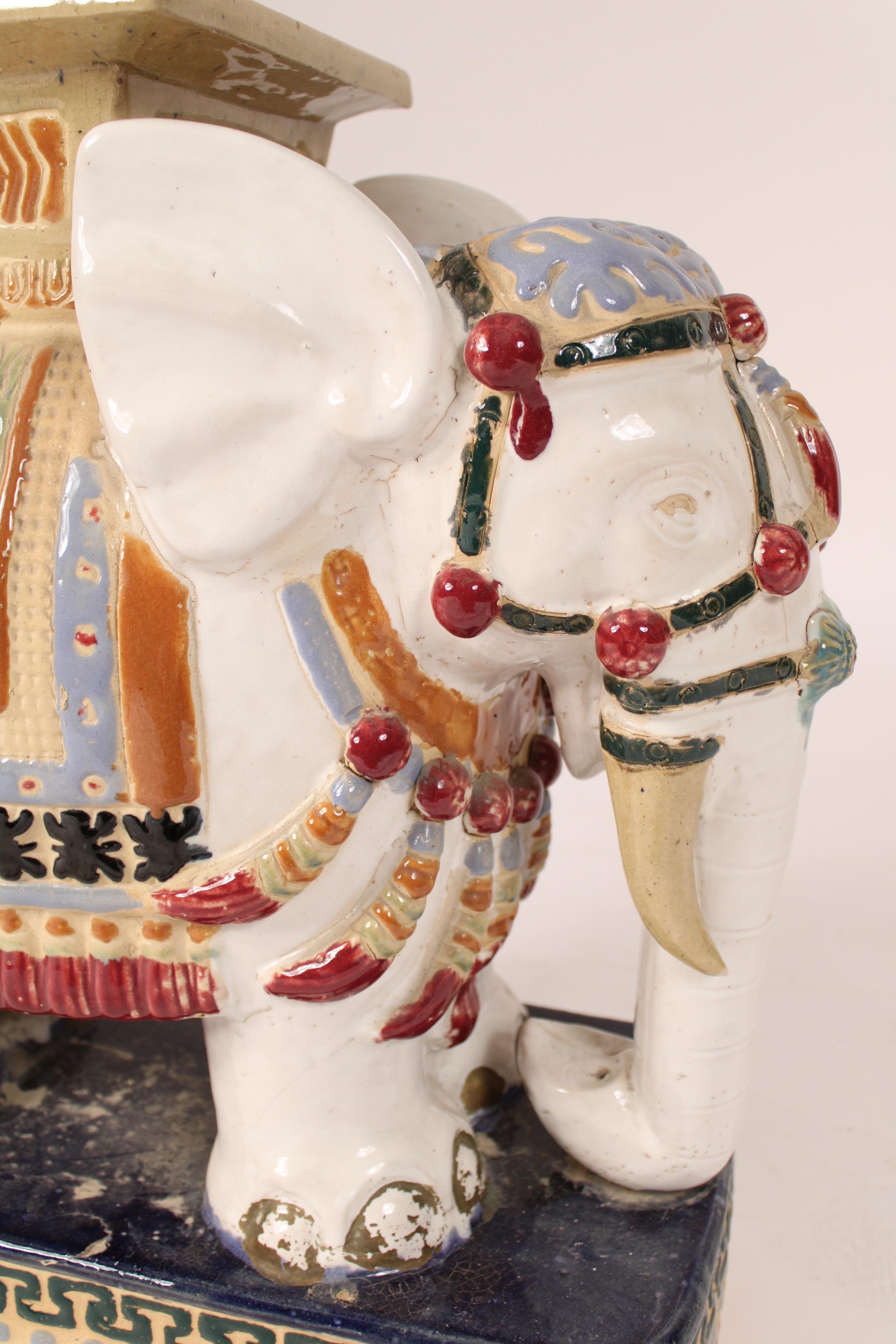 Pair of Chinese Polychrome decorated stoneware elephants Form Garden Seats 1