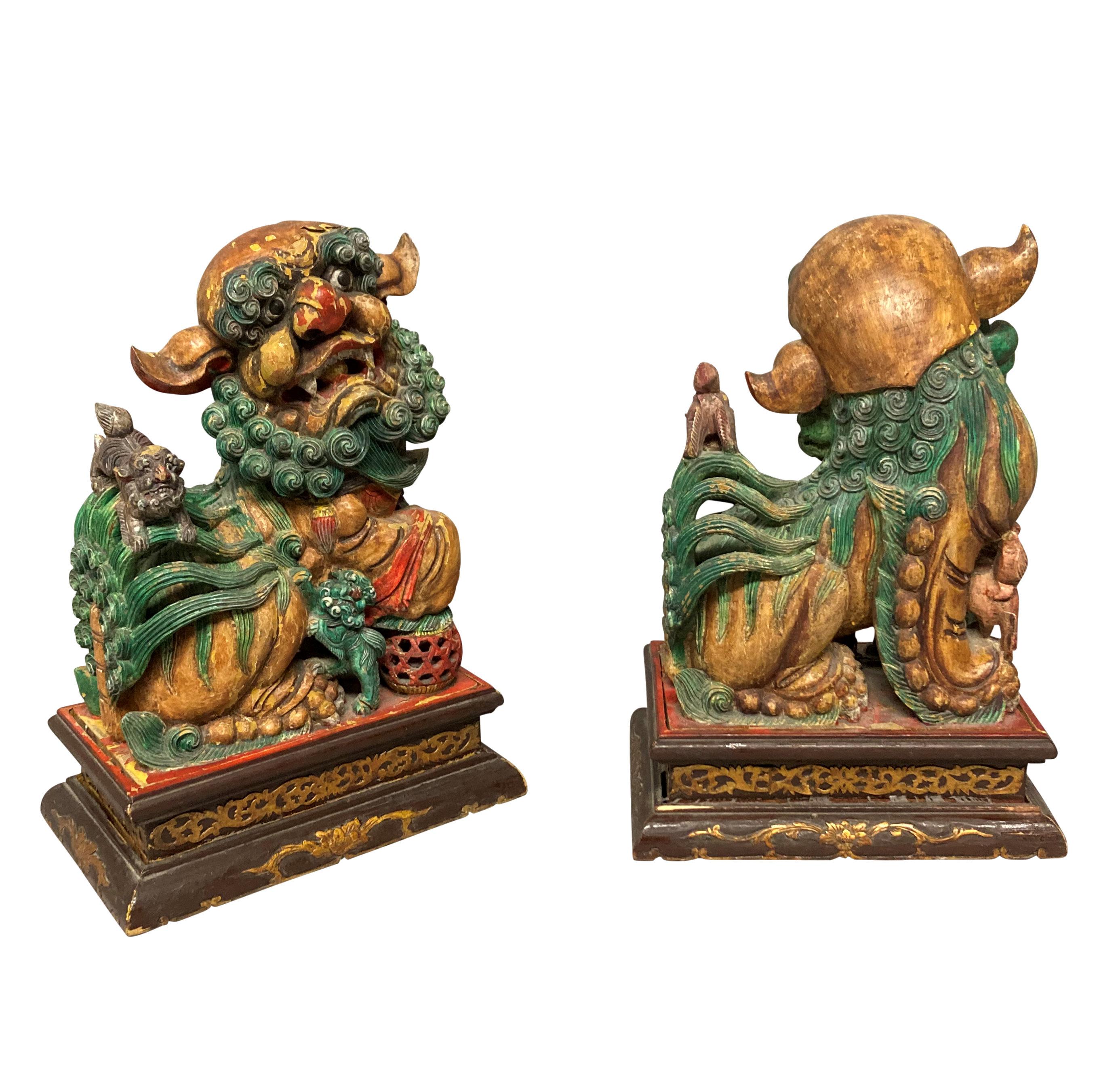 Early 20th Century Pair of Chinese Polychrome Painted Foo Dogs