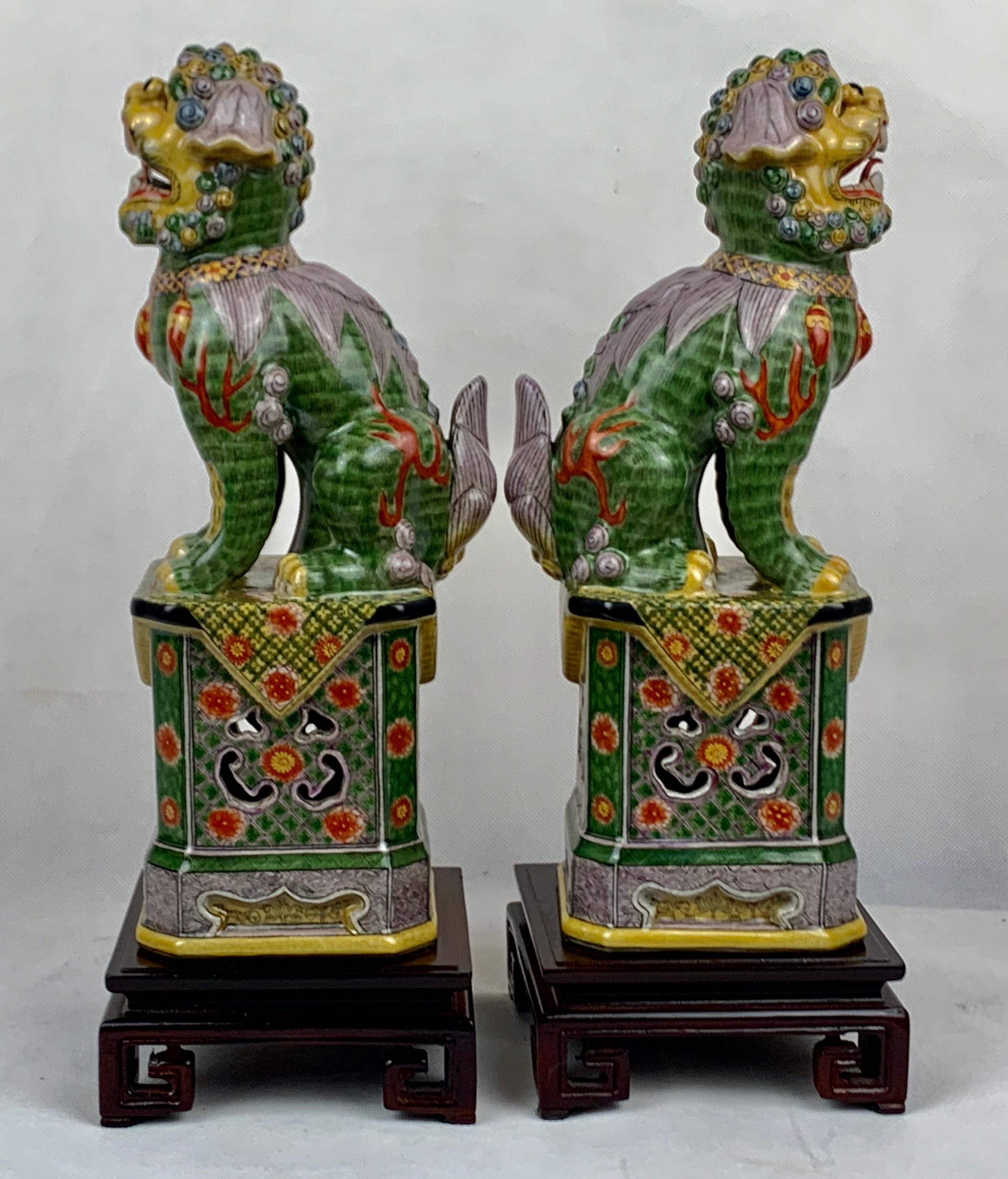 Chinoiserie Pair of Polychromed Porcelain Chinese Foo Dogs on Stands-Green, Yellow, Red