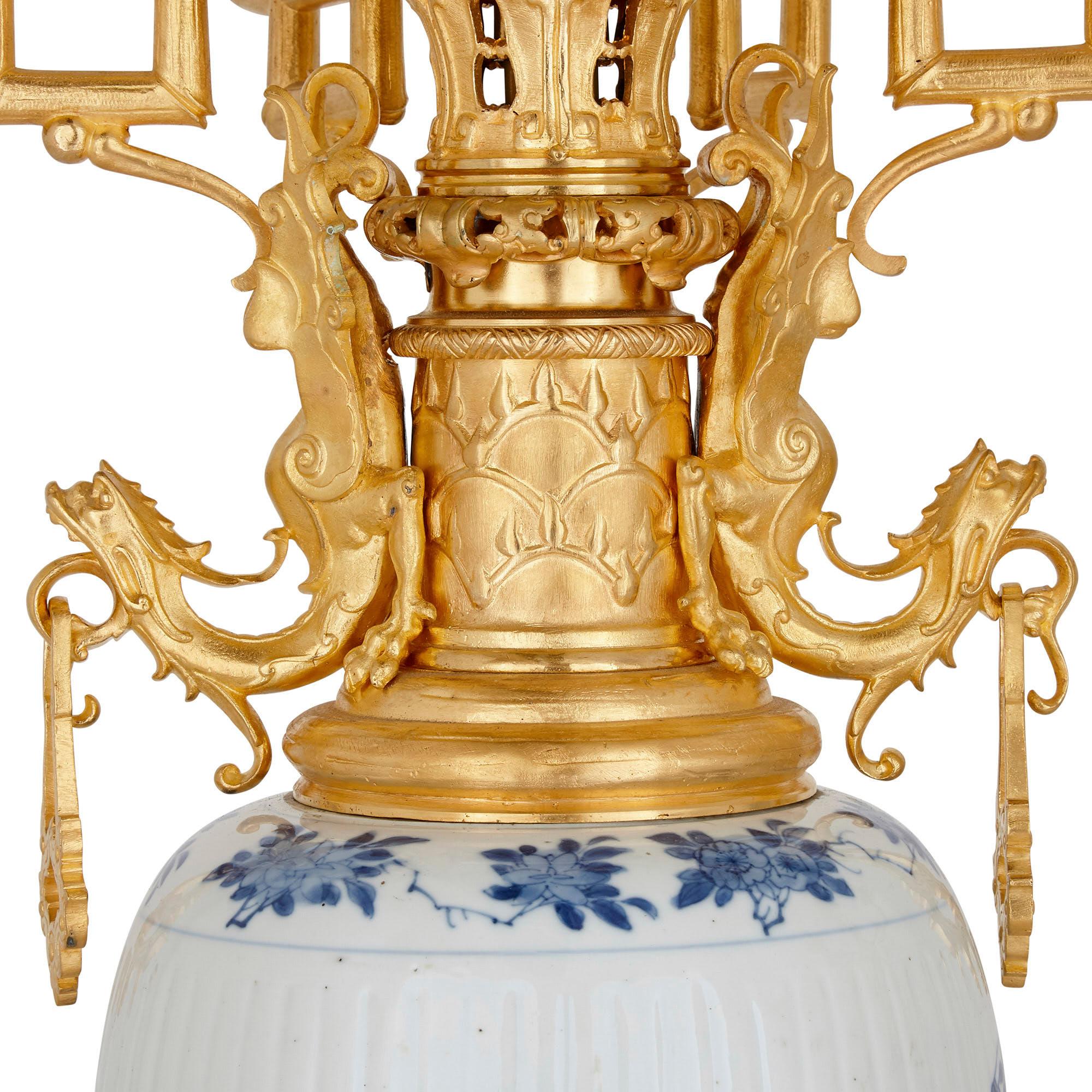 19th Century Pair of Chinese Porcelain and French Chinoiserie Style Gilt Bronze Candelabra For Sale