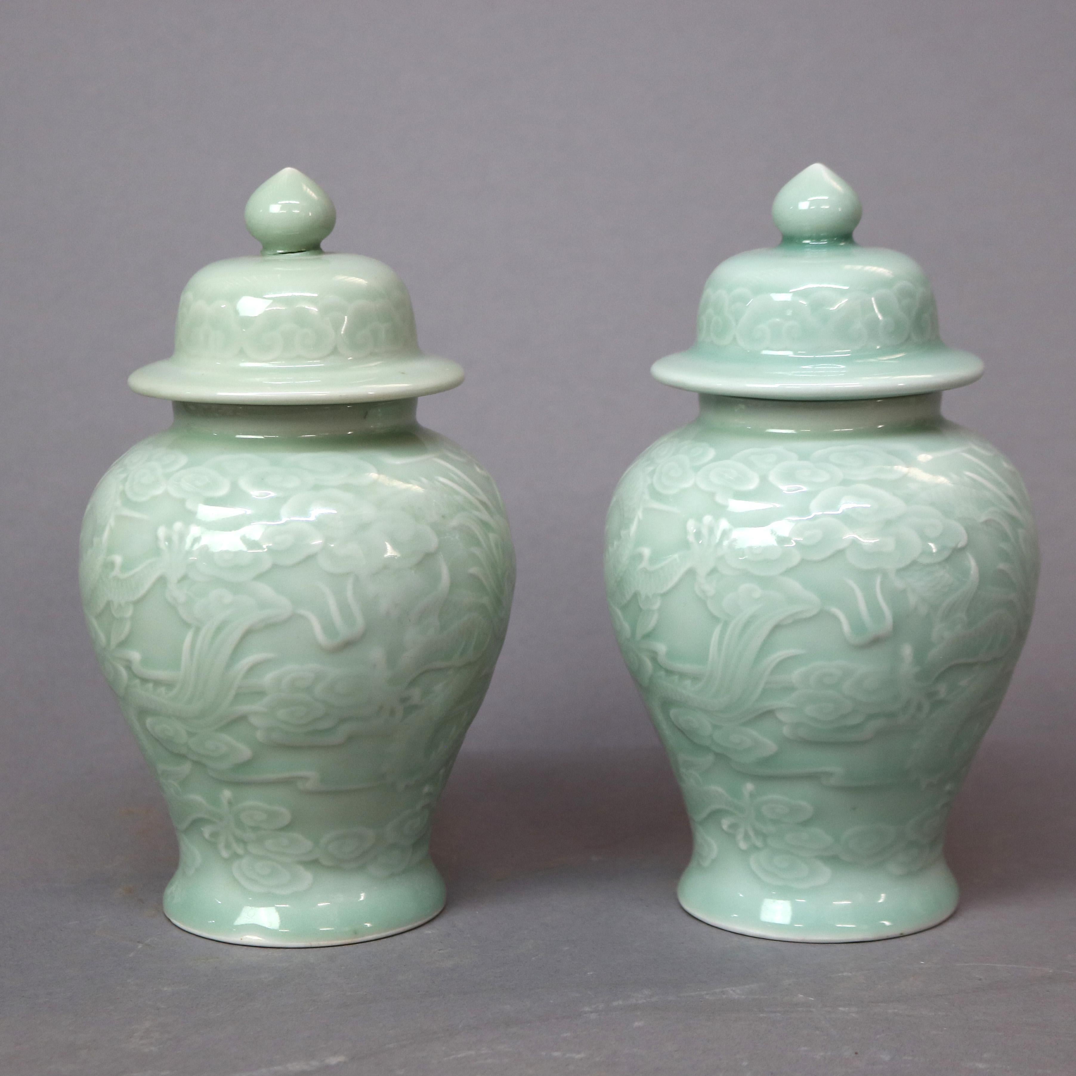 Pair of Chinese Porcelain Celadon Dragon Urns, 20th Century In Good Condition For Sale In Big Flats, NY