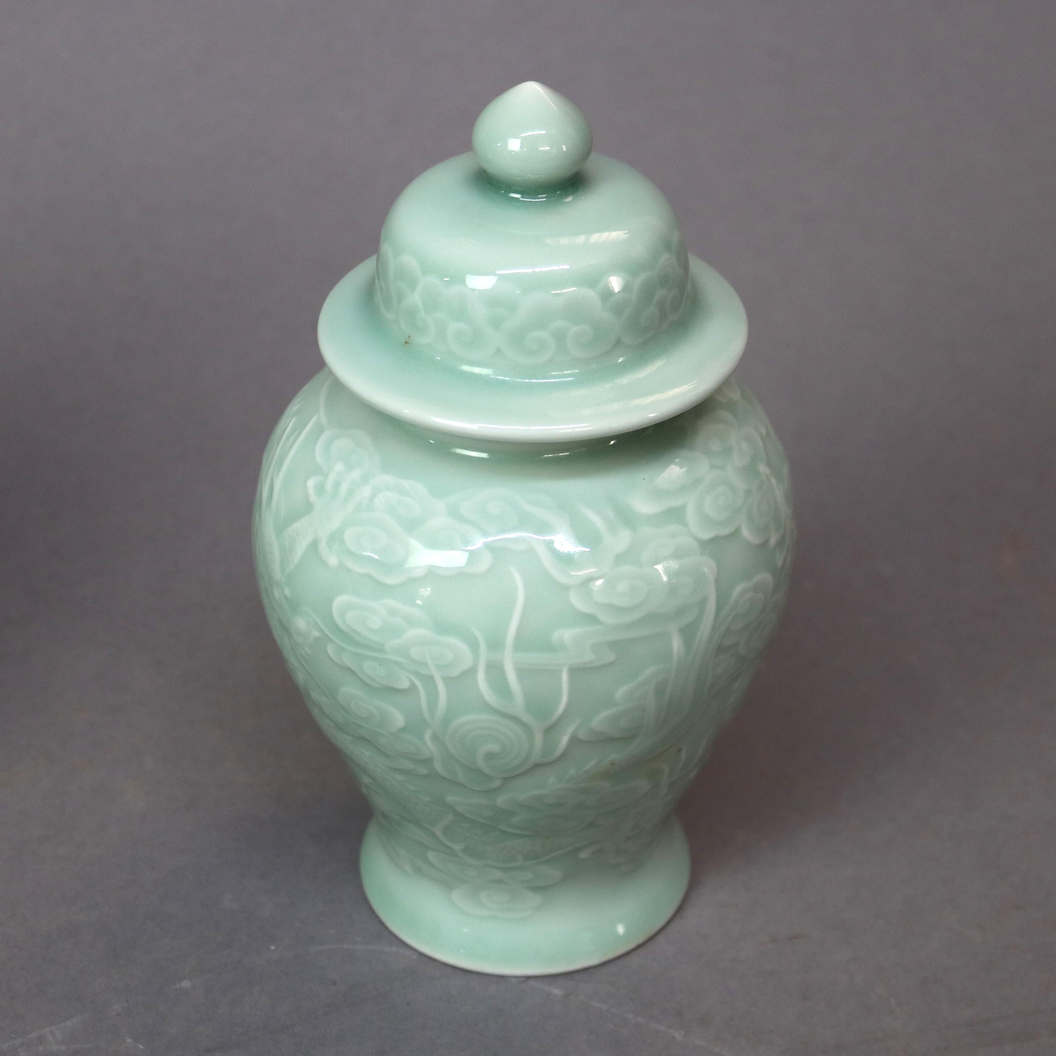 Pair of Chinese Porcelain Celadon Dragon Urns, 20th Century For Sale 4