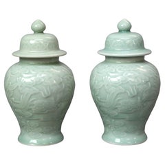 Pair of Chinese Porcelain Celadon Dragon Urns, 20th Century