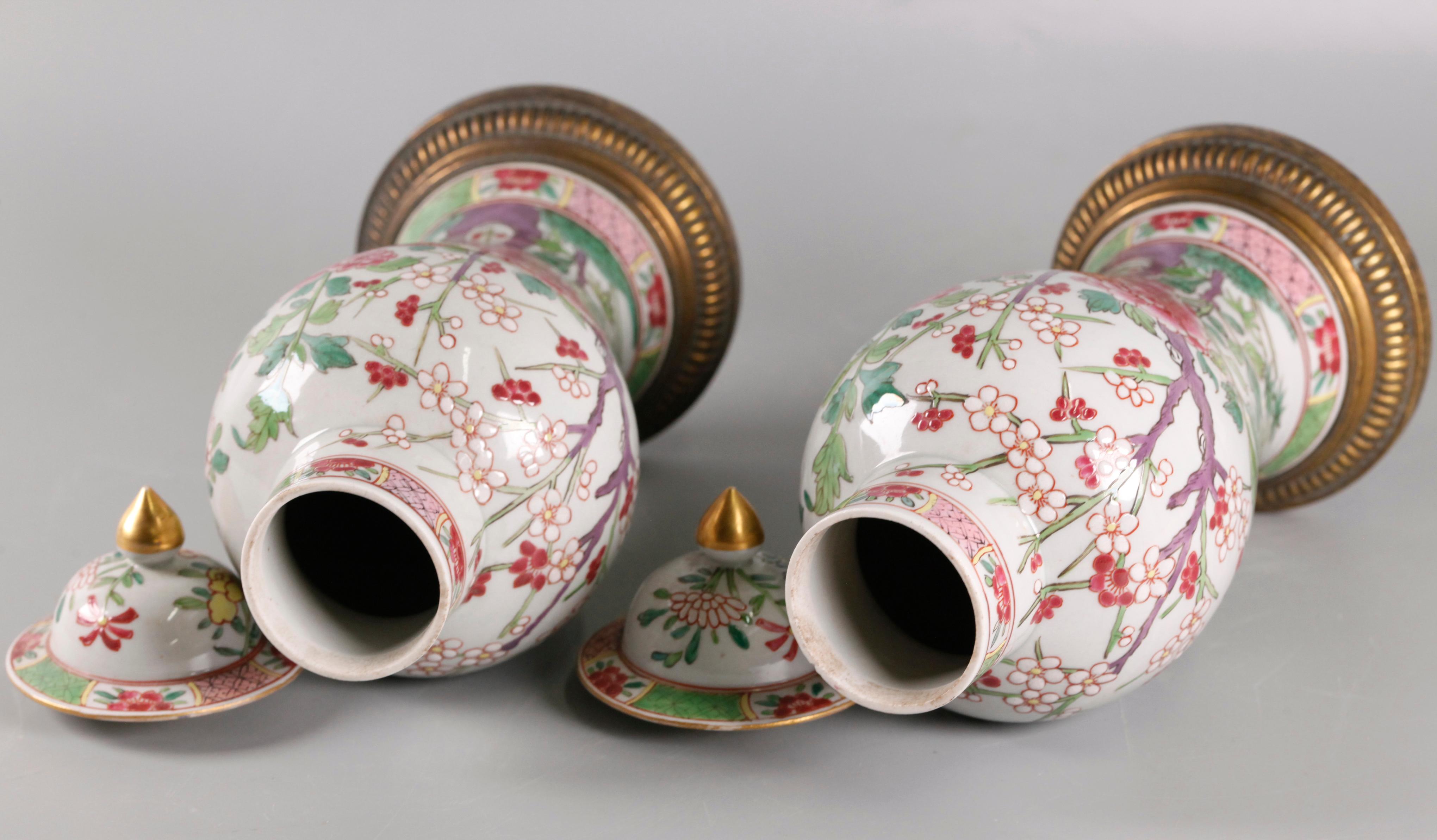 floral motif; 10in is the height of each cover vase including the base 