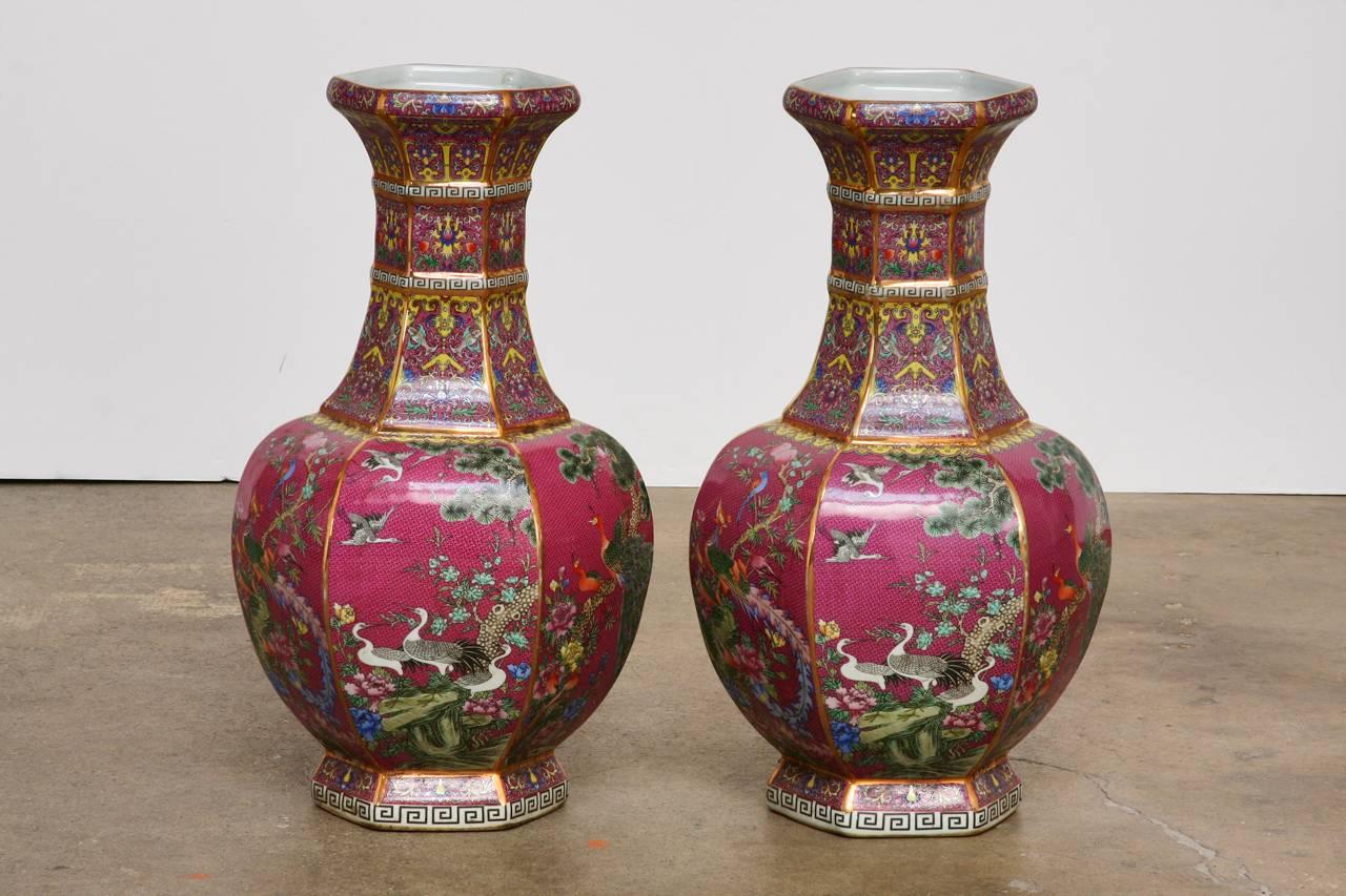 Pair of Chinese Porcelain Flora and Fauna Pink Vases In Excellent Condition In Rio Vista, CA