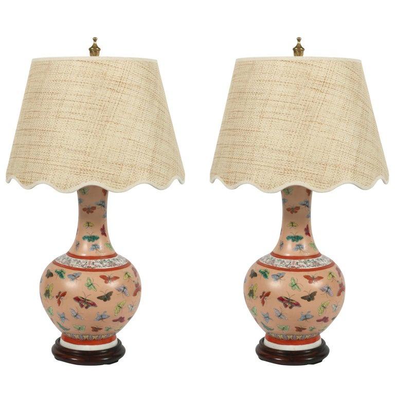 Pair of Chinese Porcelain Lamps with Butterflies on Wood Base In Good Condition In Locust Valley, NY