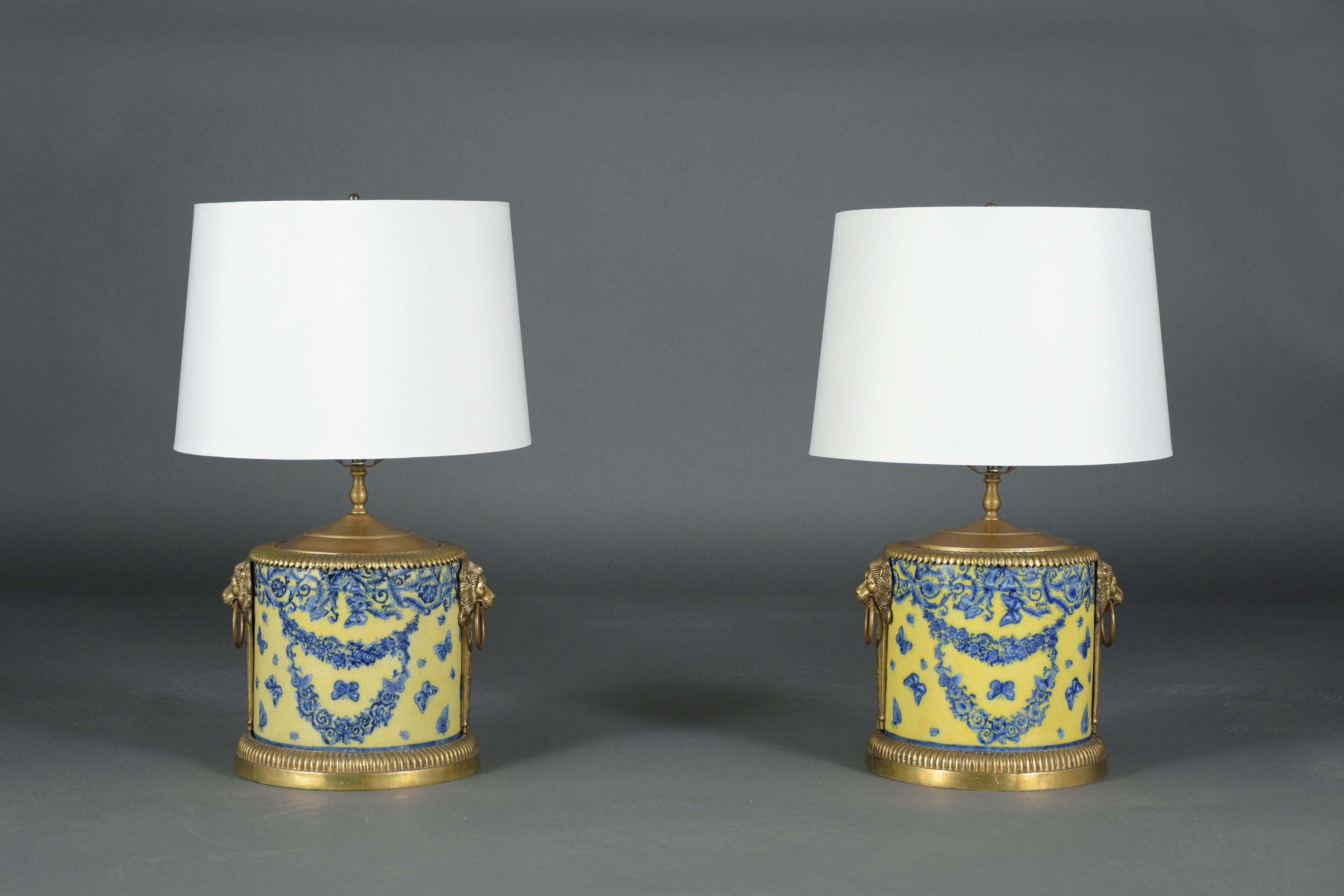 Discover the exquisite beauty of our French Chinoiserie Table Lamps, a pair that blends traditional craftsmanship with timeless design. These lamps are in great condition, showcasing the artistry of hand-crafted porcelain and brass. Each lamp in