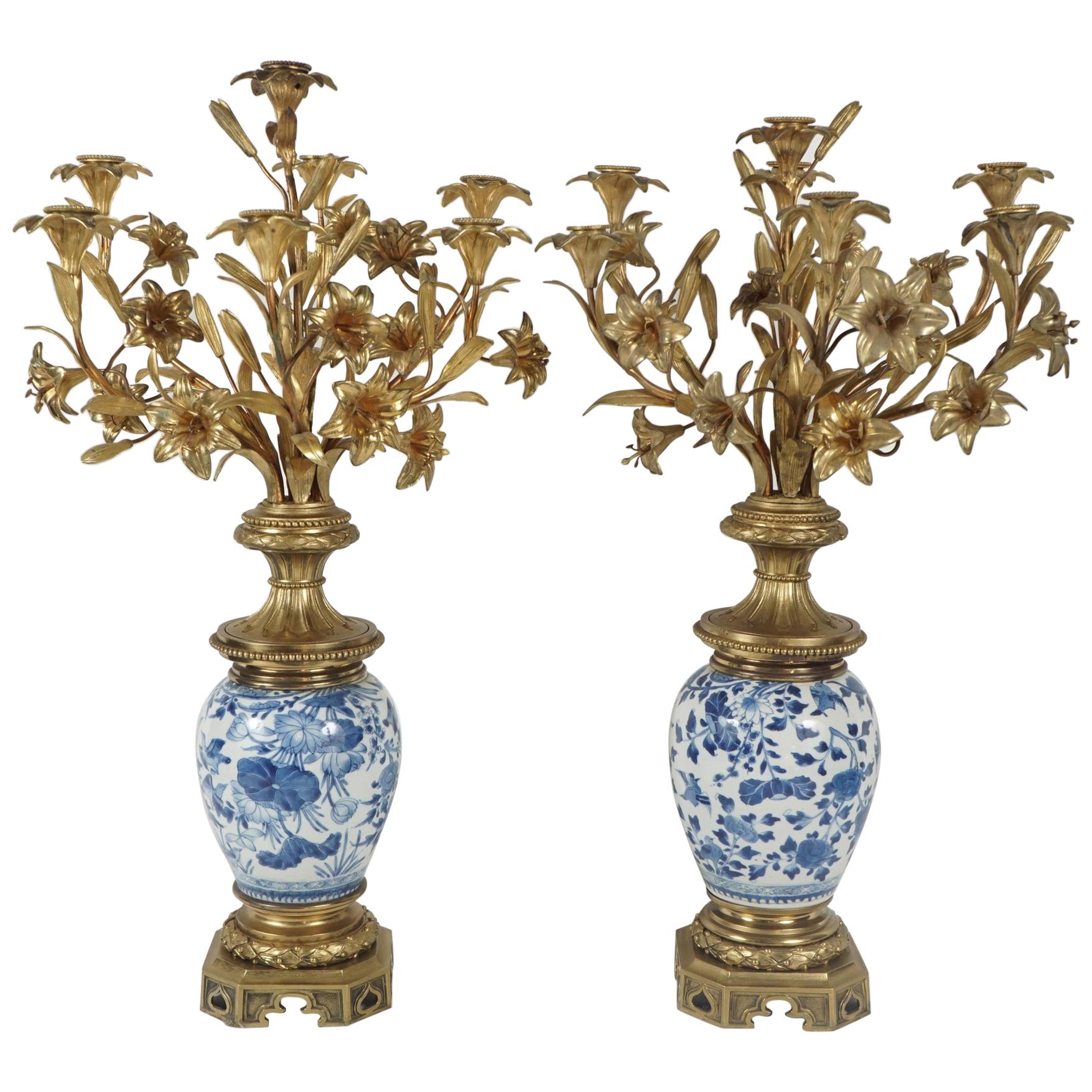 Pair of Empire Style Patinated and Gilded Bronze Candelabra For Sale at
