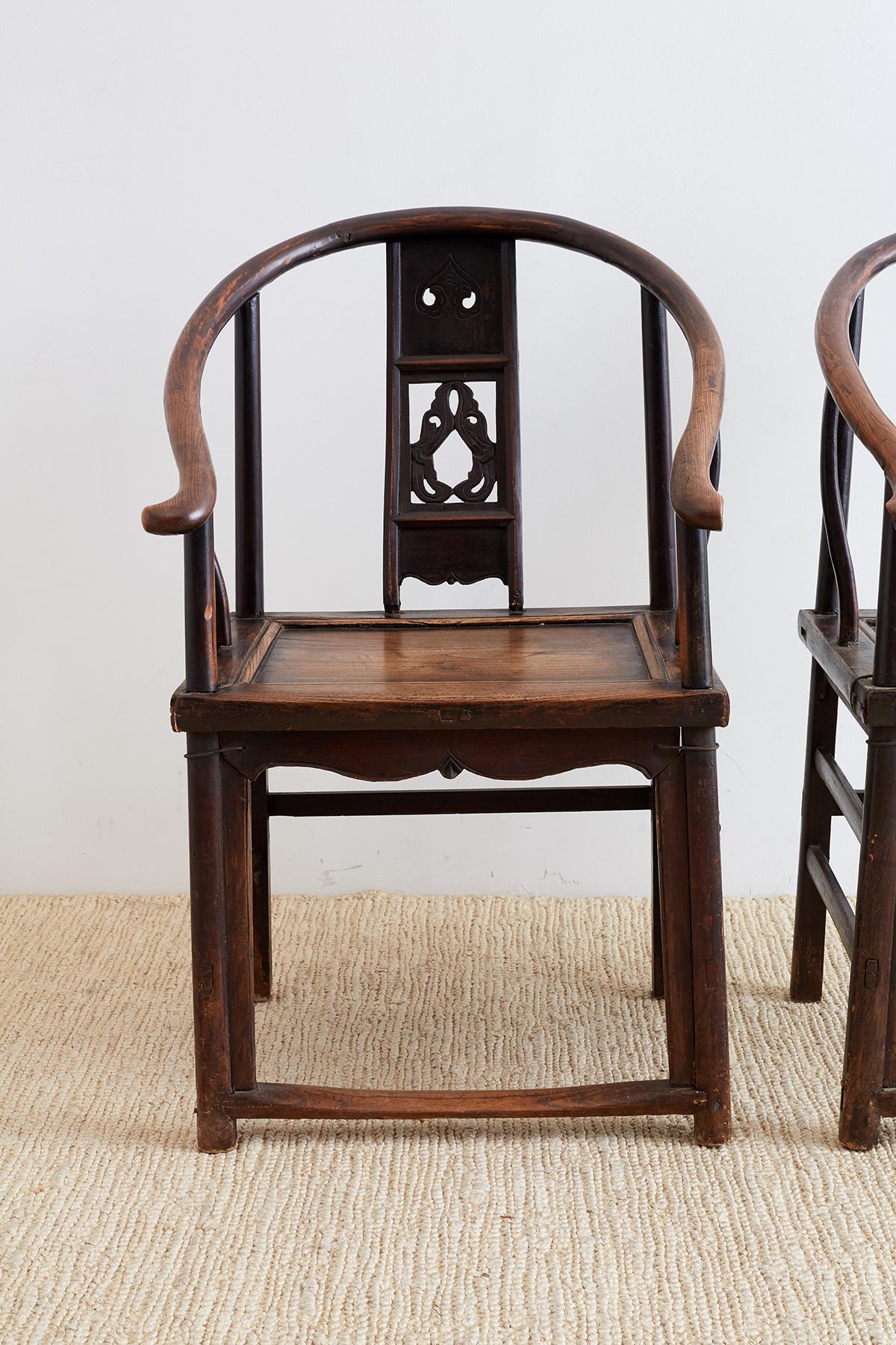 Hand-Carved Pair of Chinese Provincial Qing Horseshoe Chairs