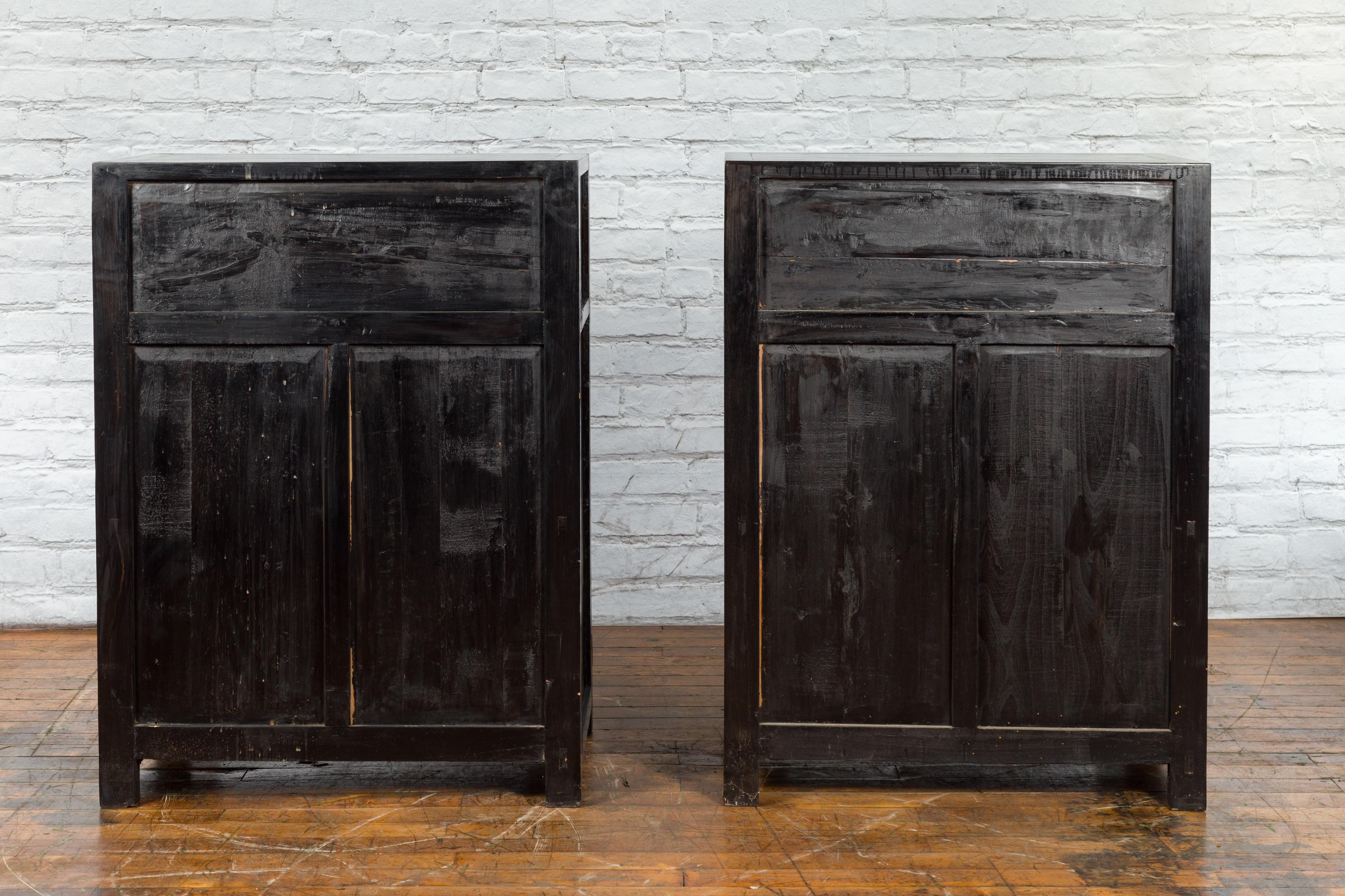 Pair of Chinese Qing Dynasty Black Lacquer Cabinets with Hand Painted Motifs For Sale 11