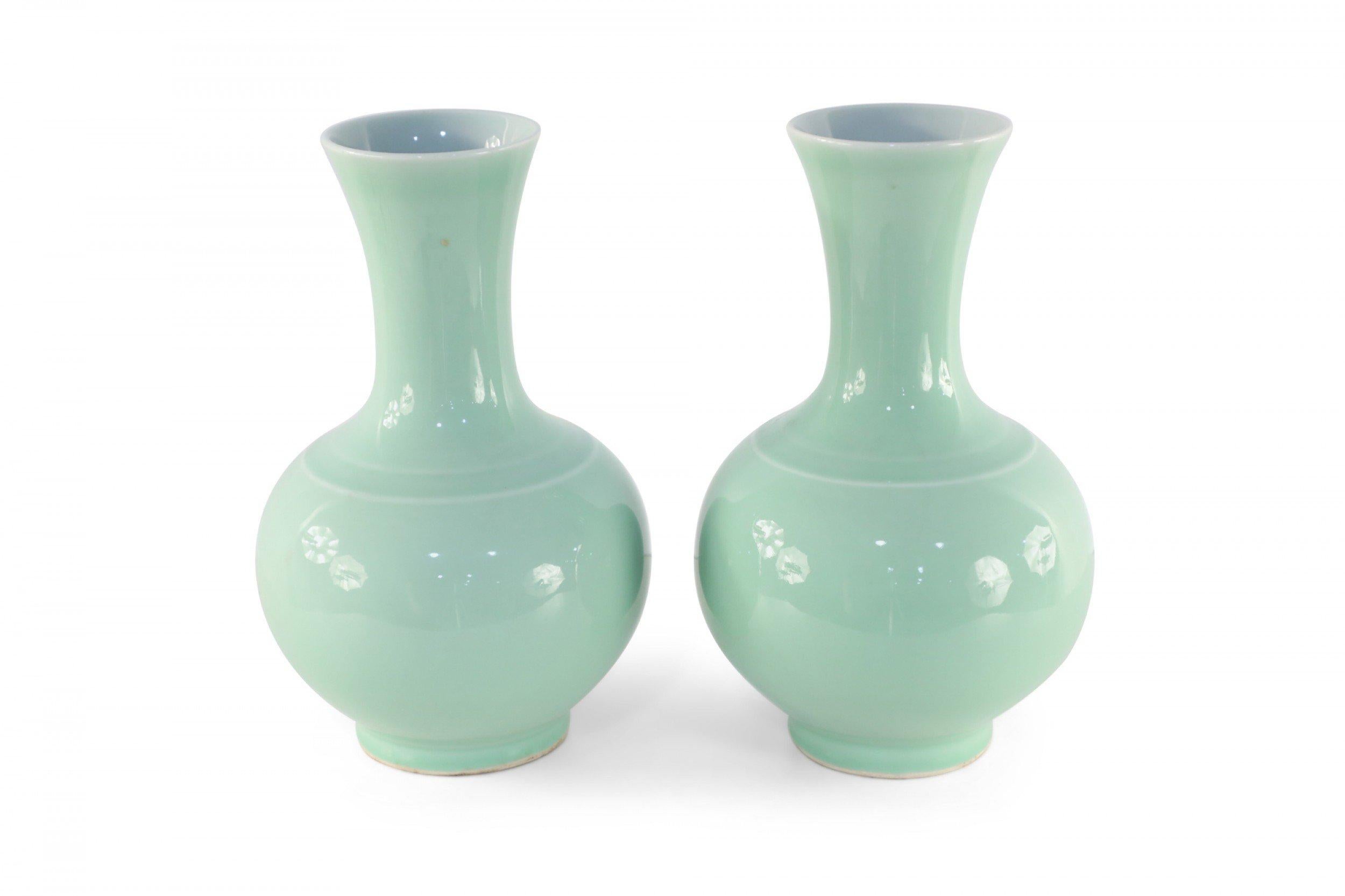 Pair of Chinese Qing Style Mint Green Glazed Globular Porcelain Vases In Good Condition For Sale In New York, NY
