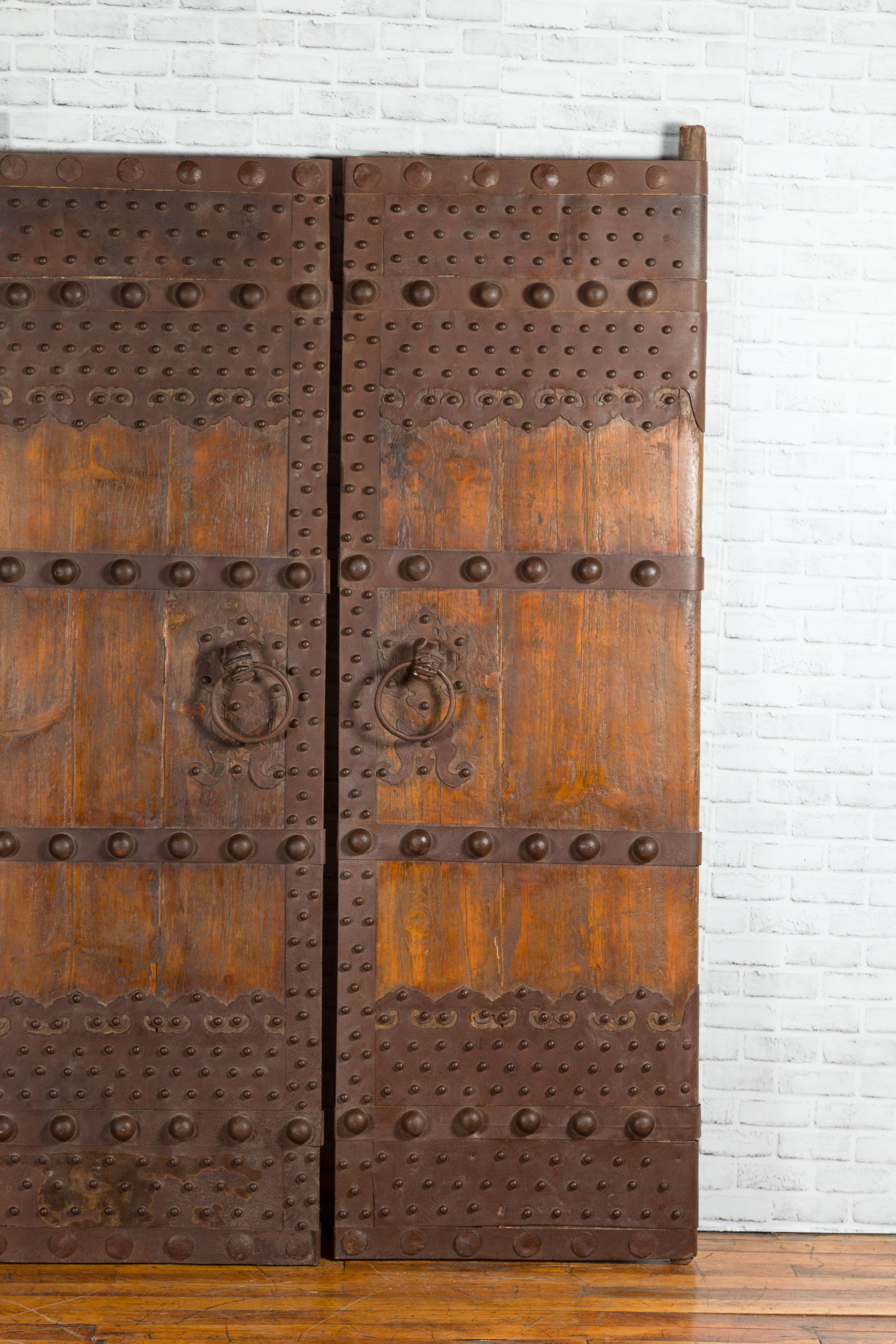 Pair of Chinese Qing Dynasty Palace Doors with Iron Hardware and Dark Patina In Good Condition In Yonkers, NY
