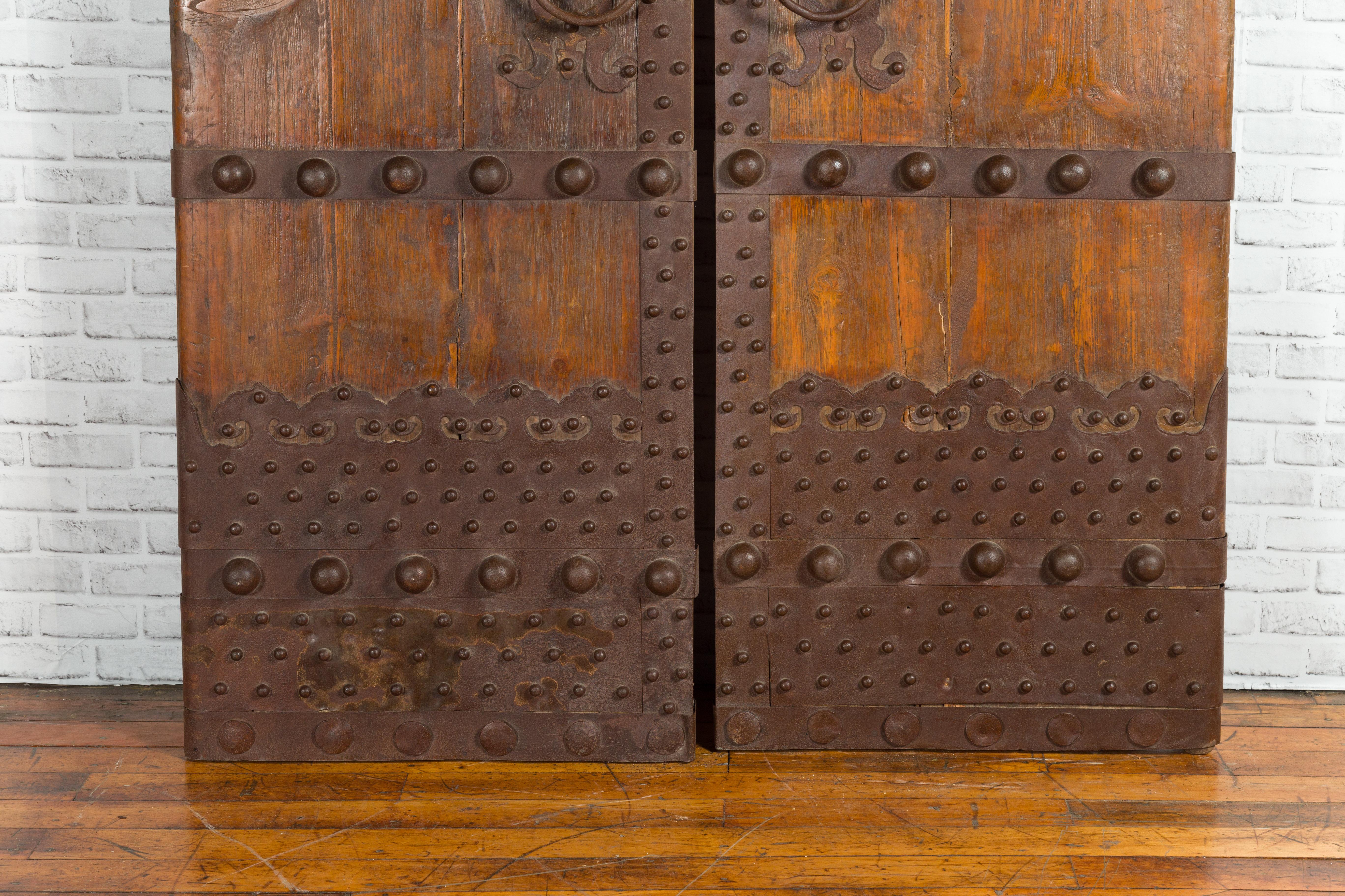Pair of Chinese Qing Dynasty Palace Doors with Iron Hardware and Dark Patina 1