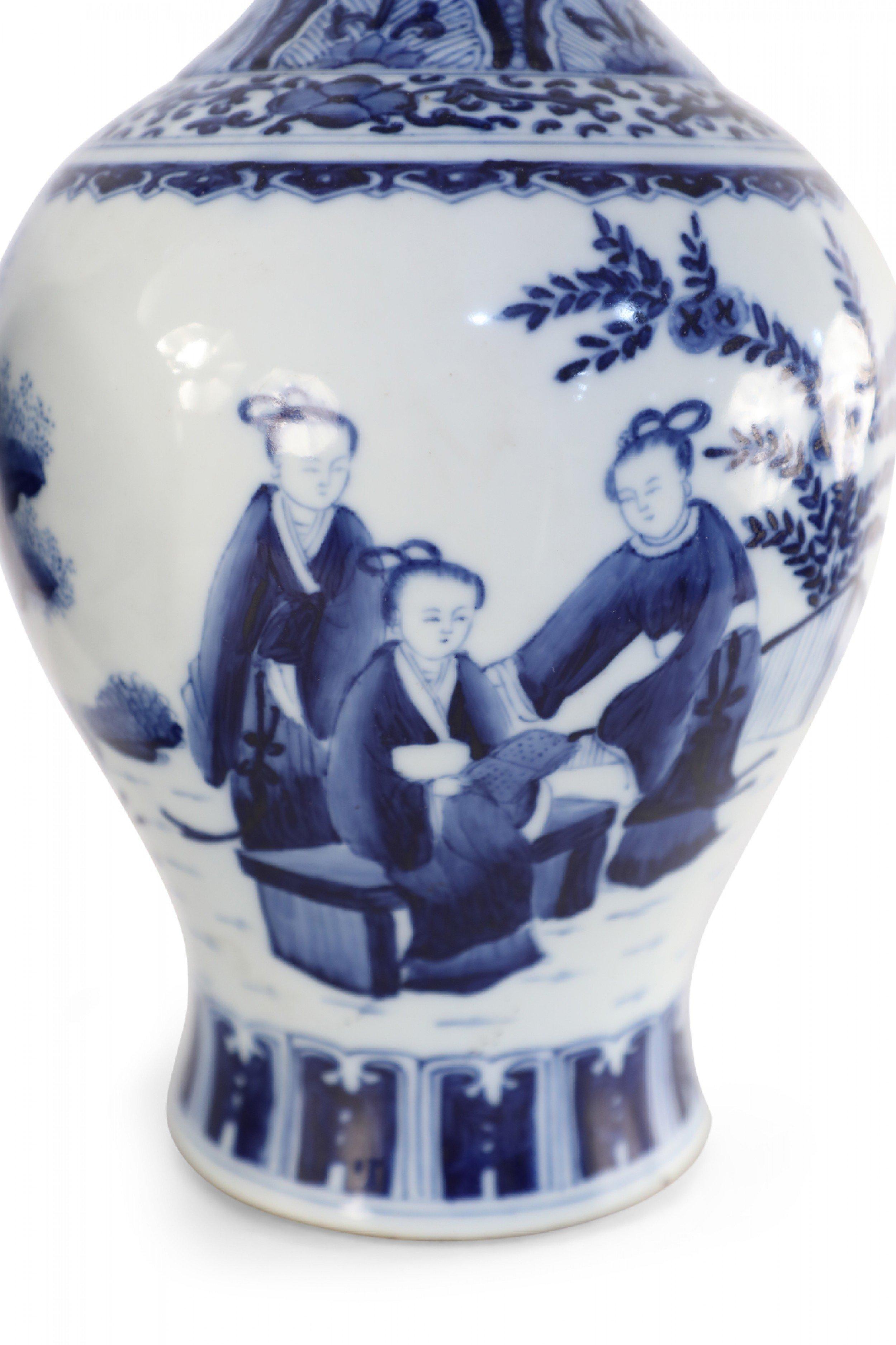 Chinese Export Pair of Chinese Qing Dynasty White and Blue Figurative Scene Porcelain Vases